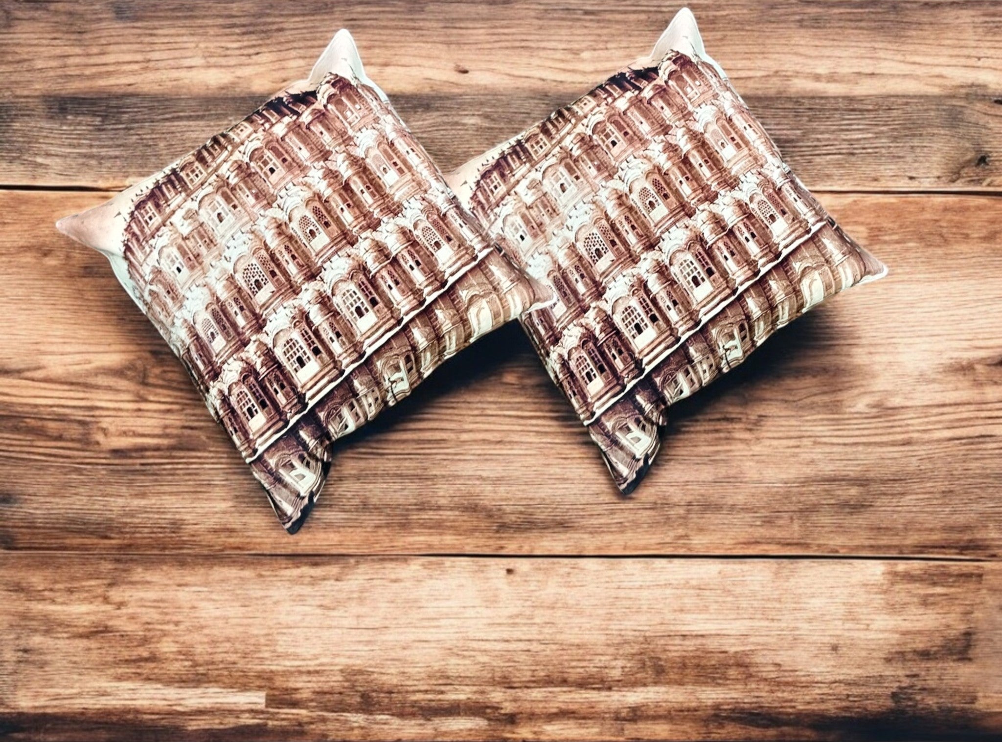 Set of 2 decorative throw pillow covers with high-resolution multicolor print on wooden background.