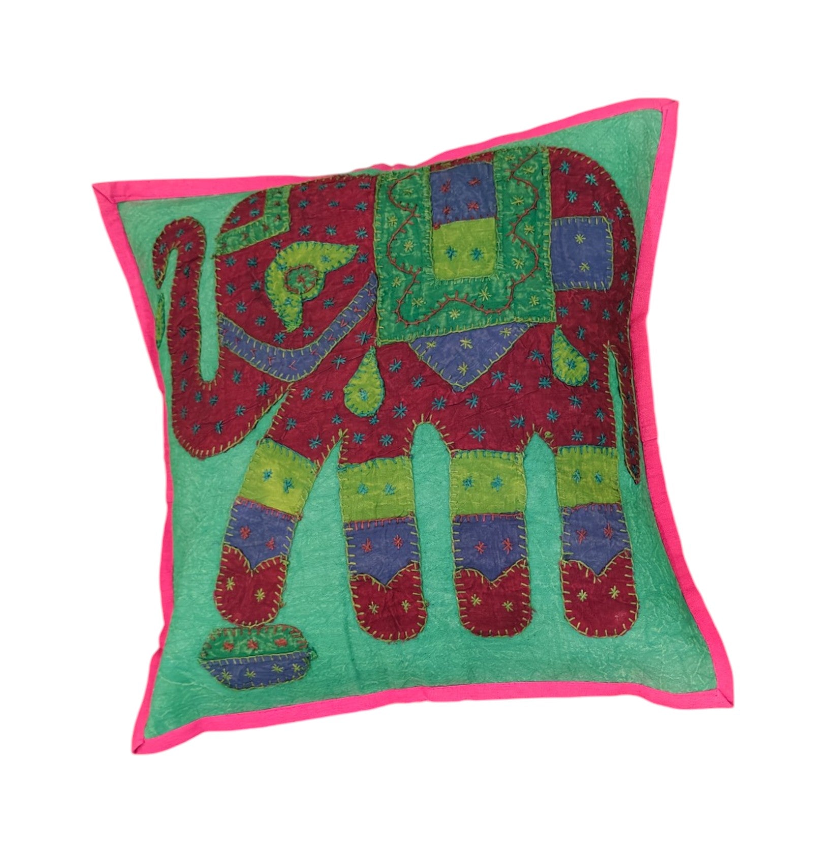 Colorful elephant cushion cover in ethnic patchwork style, bright green background with pink edge.
