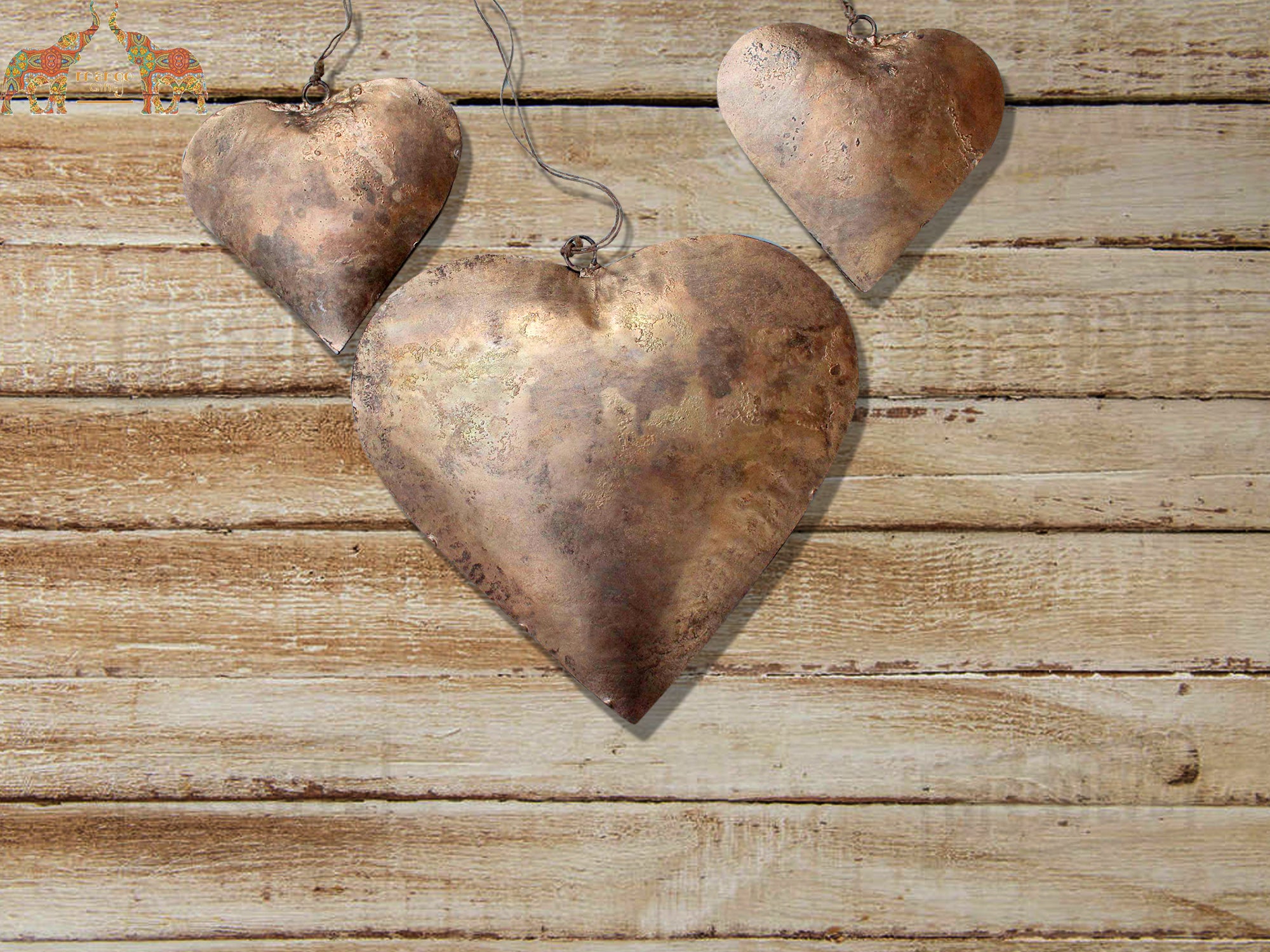 Handmade Indian metal crafts. Large, charming heart hangings made from recycled iron—perfect love gifts for weddings.
