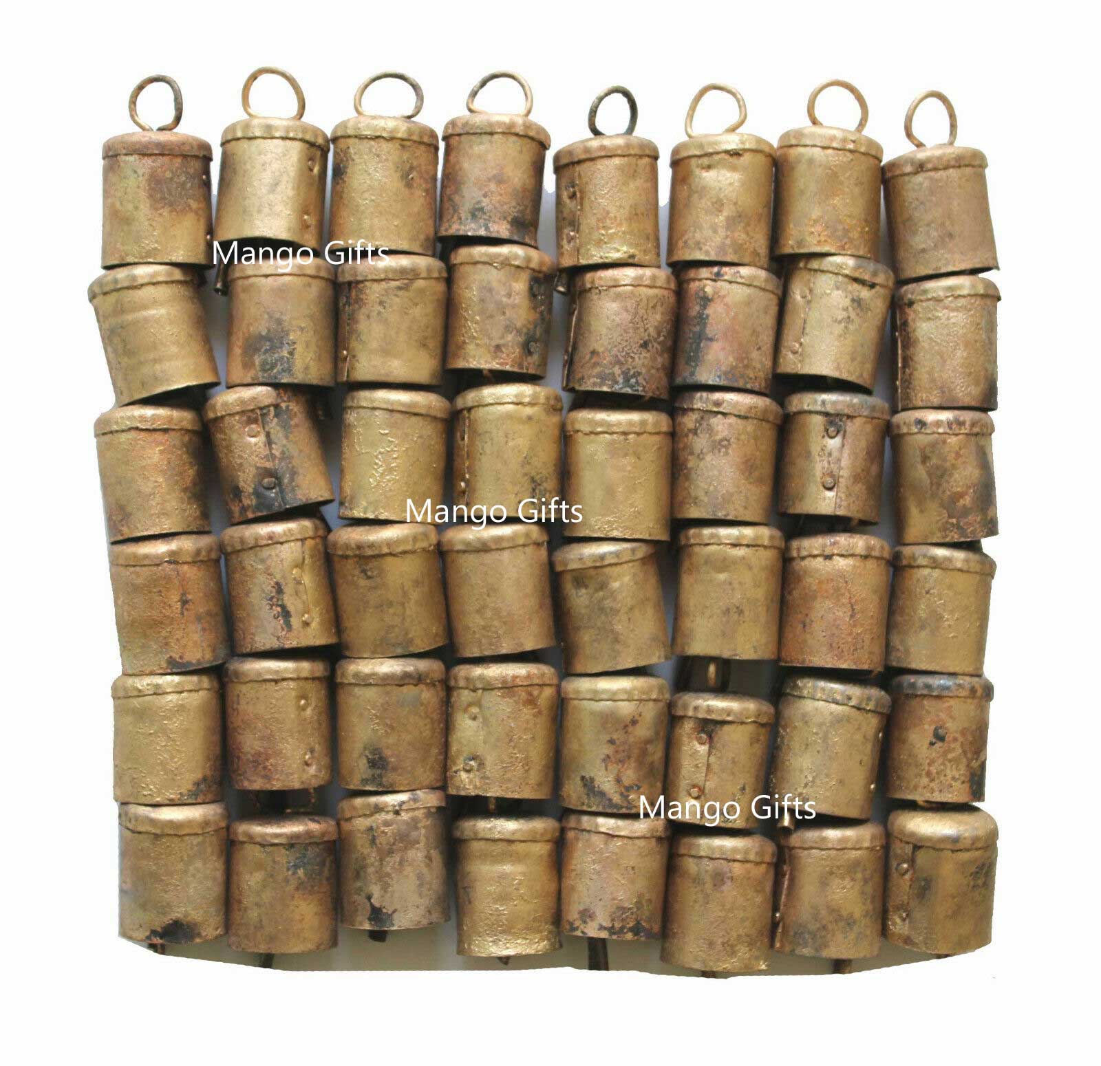 Handmade Indian cow bells in rustic brass finish, measuring 2" height, perfect for decoration and crafts.
