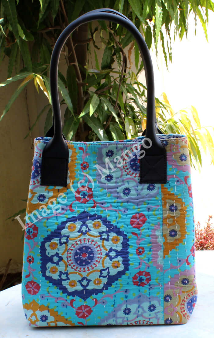 Colorful blue Kantha tote bag with floral design, perfect for casual outings and everyday use.