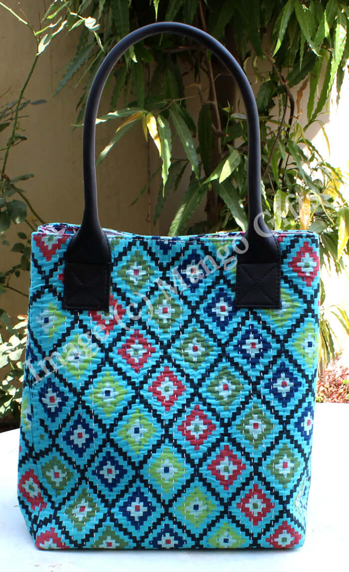Handmade blue geometric tote bag with leather straps, perfect for shopping or picnics, featuring cotton Kantha design.
