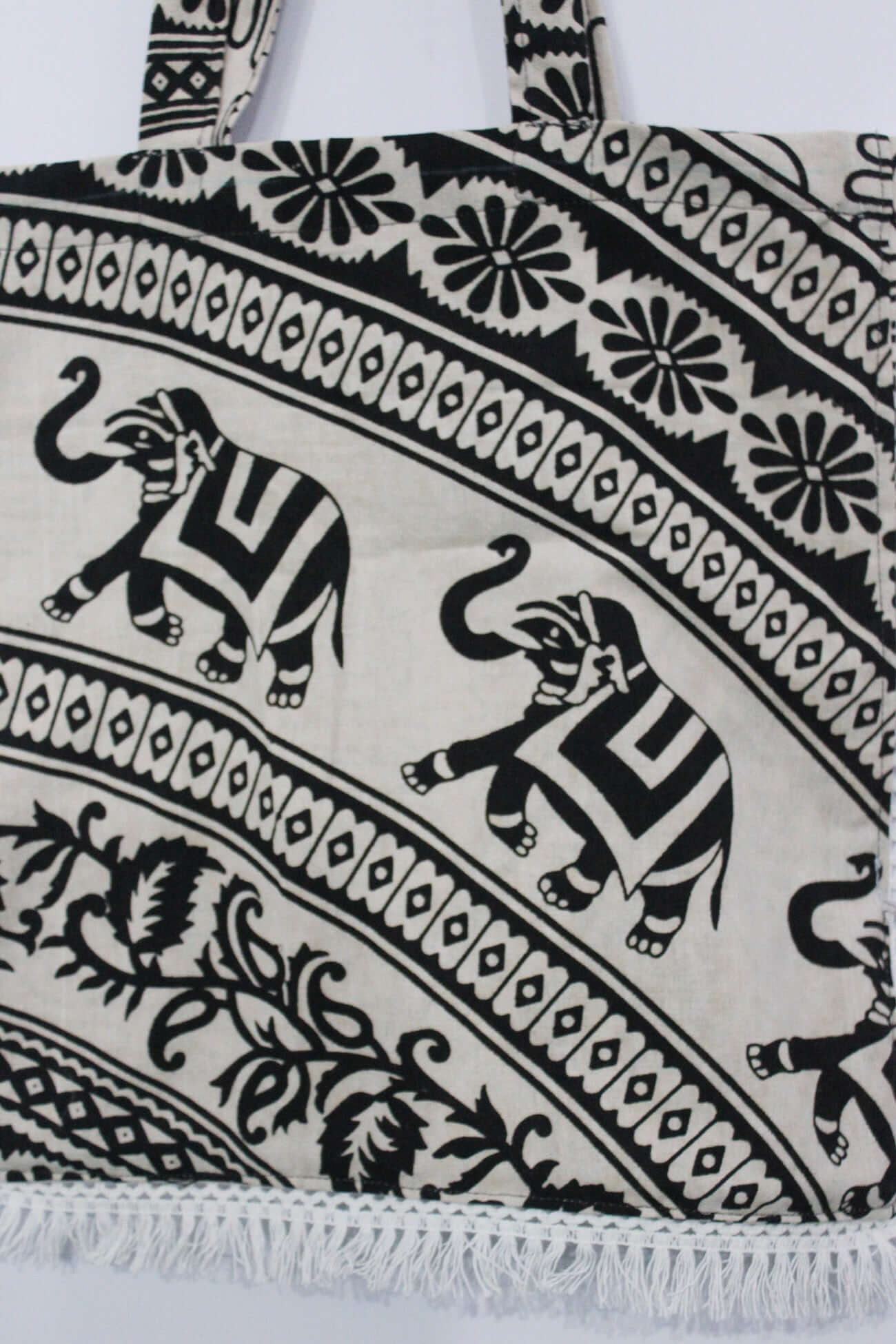 Shop 100% cotton elephant mandala beach bags. Stylish, eco-friendly, and machine washable. Perfect for shopping and picnics!