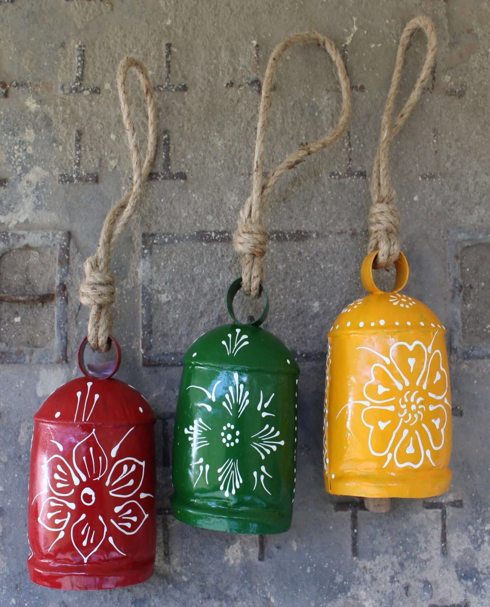 Shop our 3-piece hand-painted harmony bells set! Made from recycled iron, these colorful bells create soothing sounds for home décor.