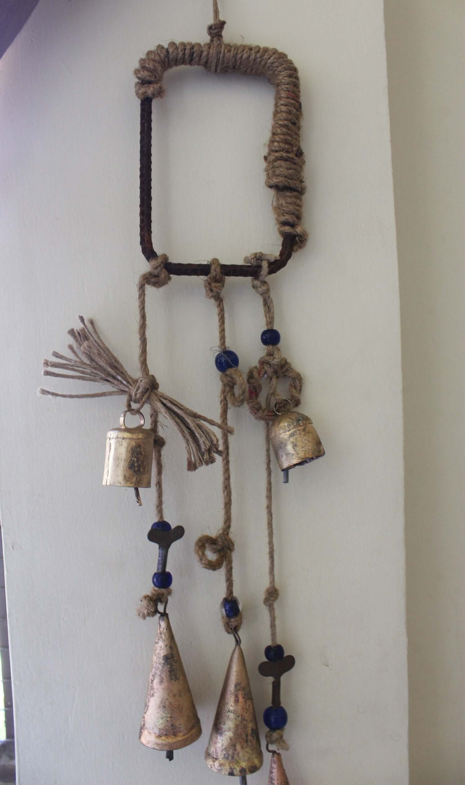 Enhance your Halloween with our handmade Witches Bells. Crafted from recycled materials, these rustic chimes bring protection and charm.