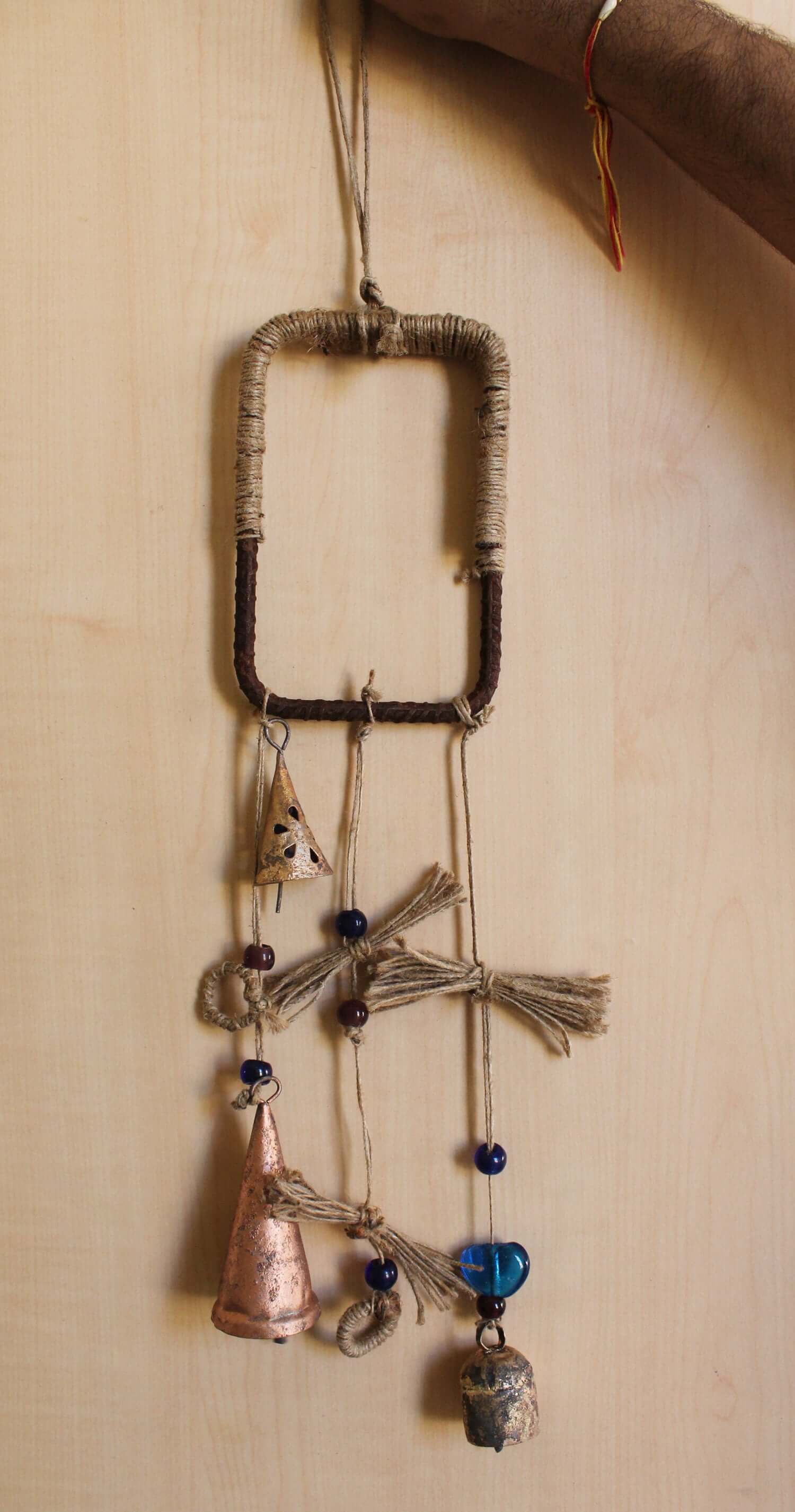 Enhance your Halloween with our handmade Witches Bells. Crafted from recycled materials, these rustic chimes bring protection and charm.