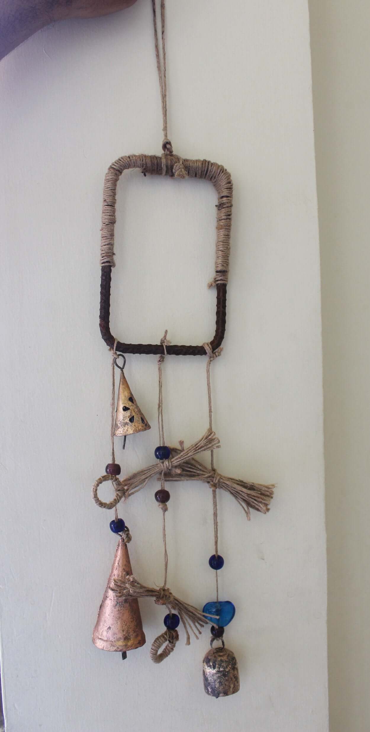 Enhance your Halloween with our handmade Witches Bells. Crafted from recycled materials, these rustic chimes bring protection and charm.