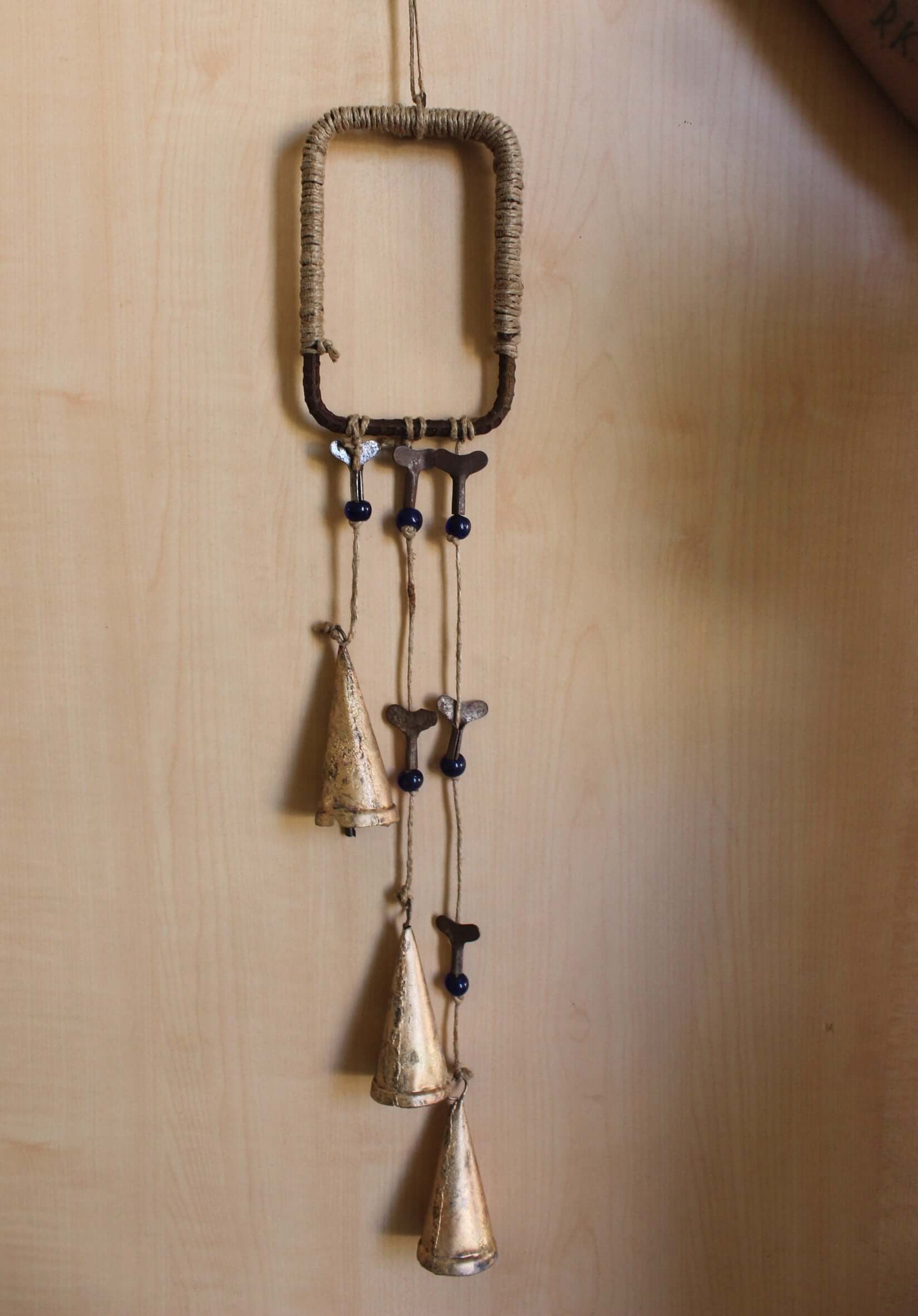 Enhance your Halloween with our handmade Witches Bells. Crafted from recycled materials, these rustic chimes bring protection and charm.