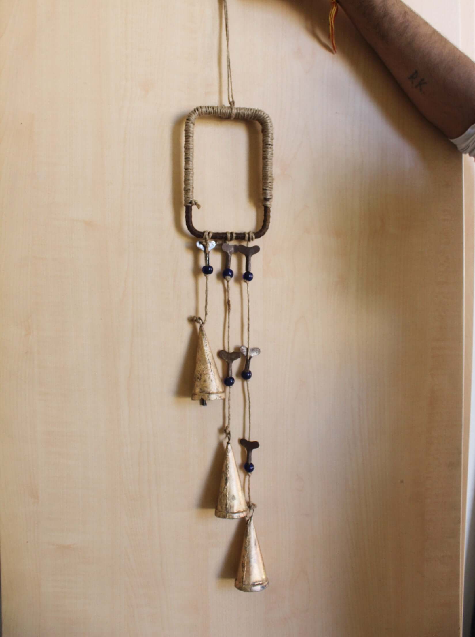 Enhance your Halloween with our handmade Witches Bells. Crafted from recycled materials, these rustic chimes bring protection and charm.