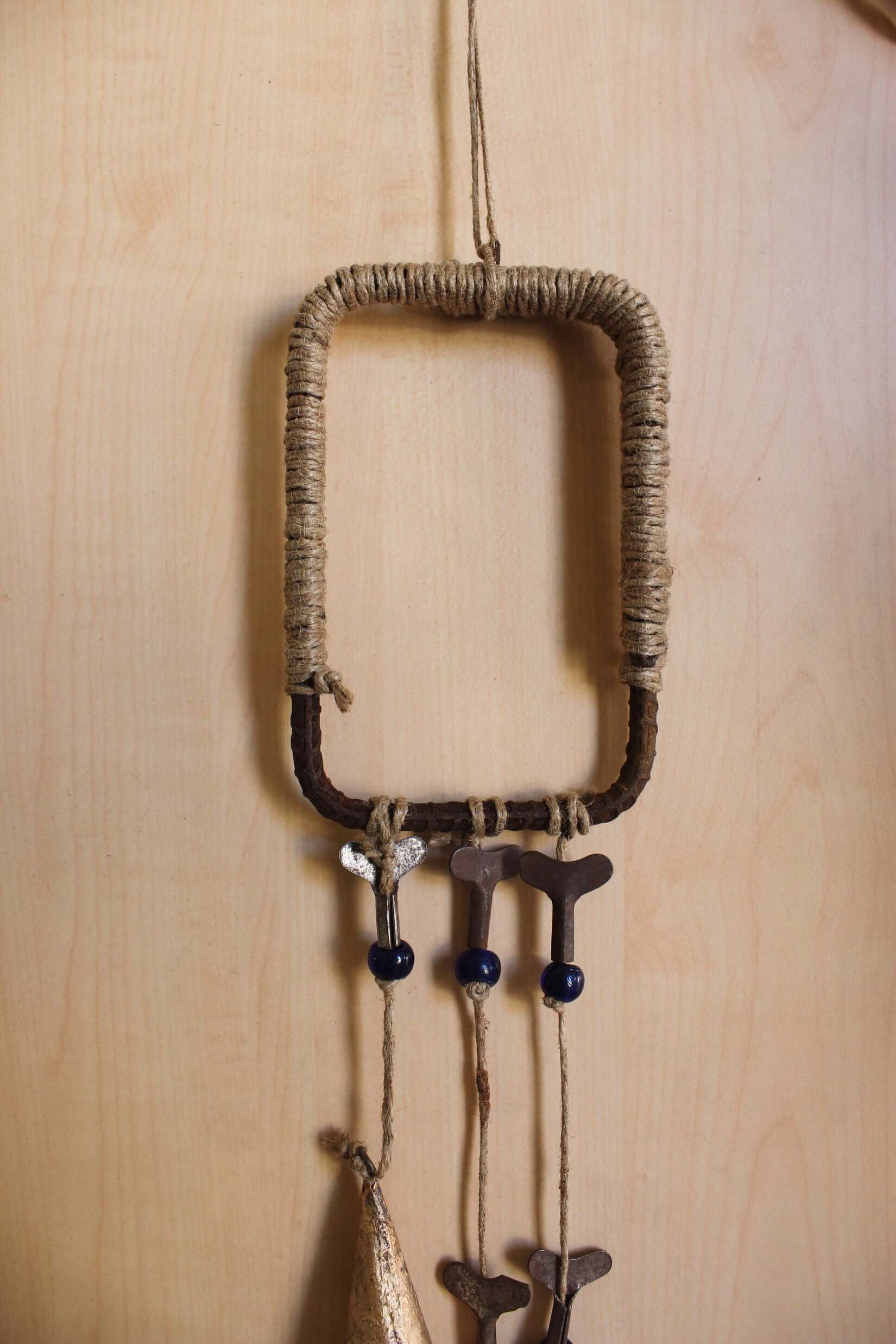 Enhance your Halloween with our handmade Witches Bells. Crafted from recycled materials, these rustic chimes bring protection and charm.