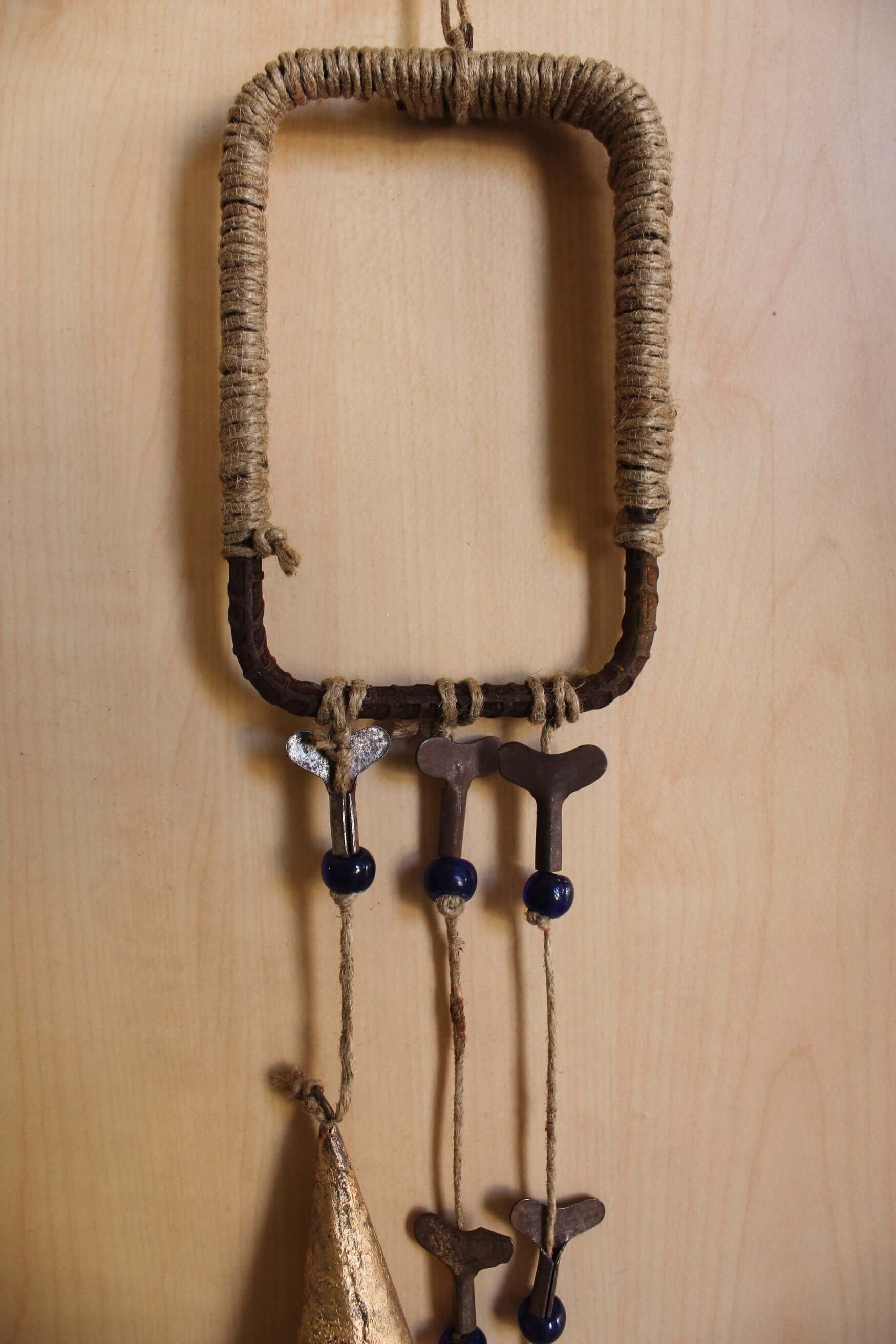 Enhance your Halloween with our handmade Witches Bells. Crafted from recycled materials, these rustic chimes bring protection and charm.