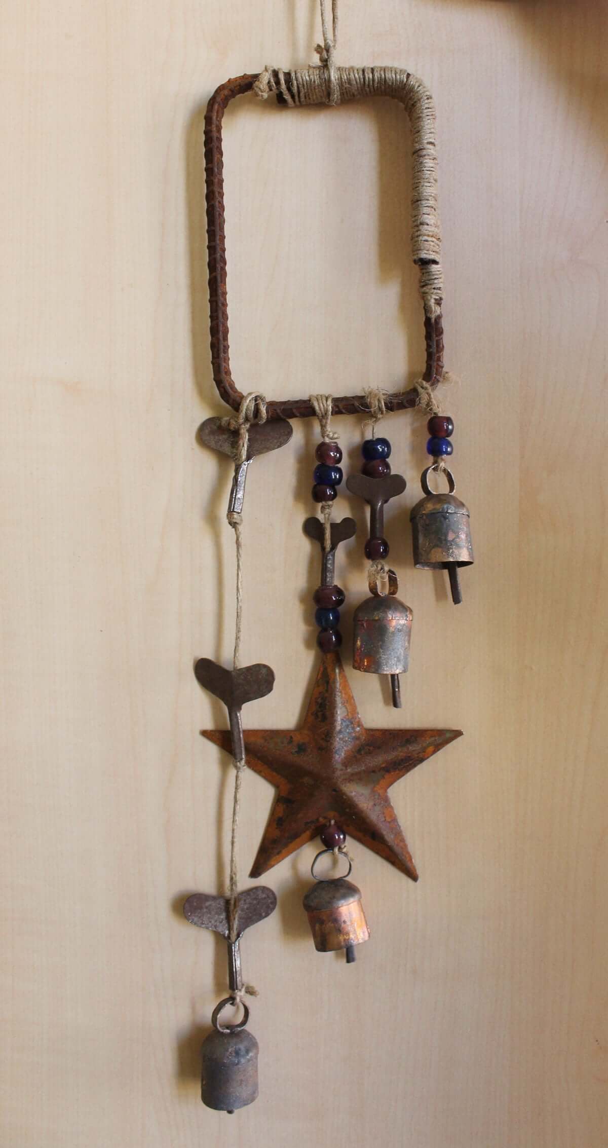 Enhance your Halloween with our handmade Witches Bells. Crafted from recycled materials, these rustic chimes bring protection and charm.