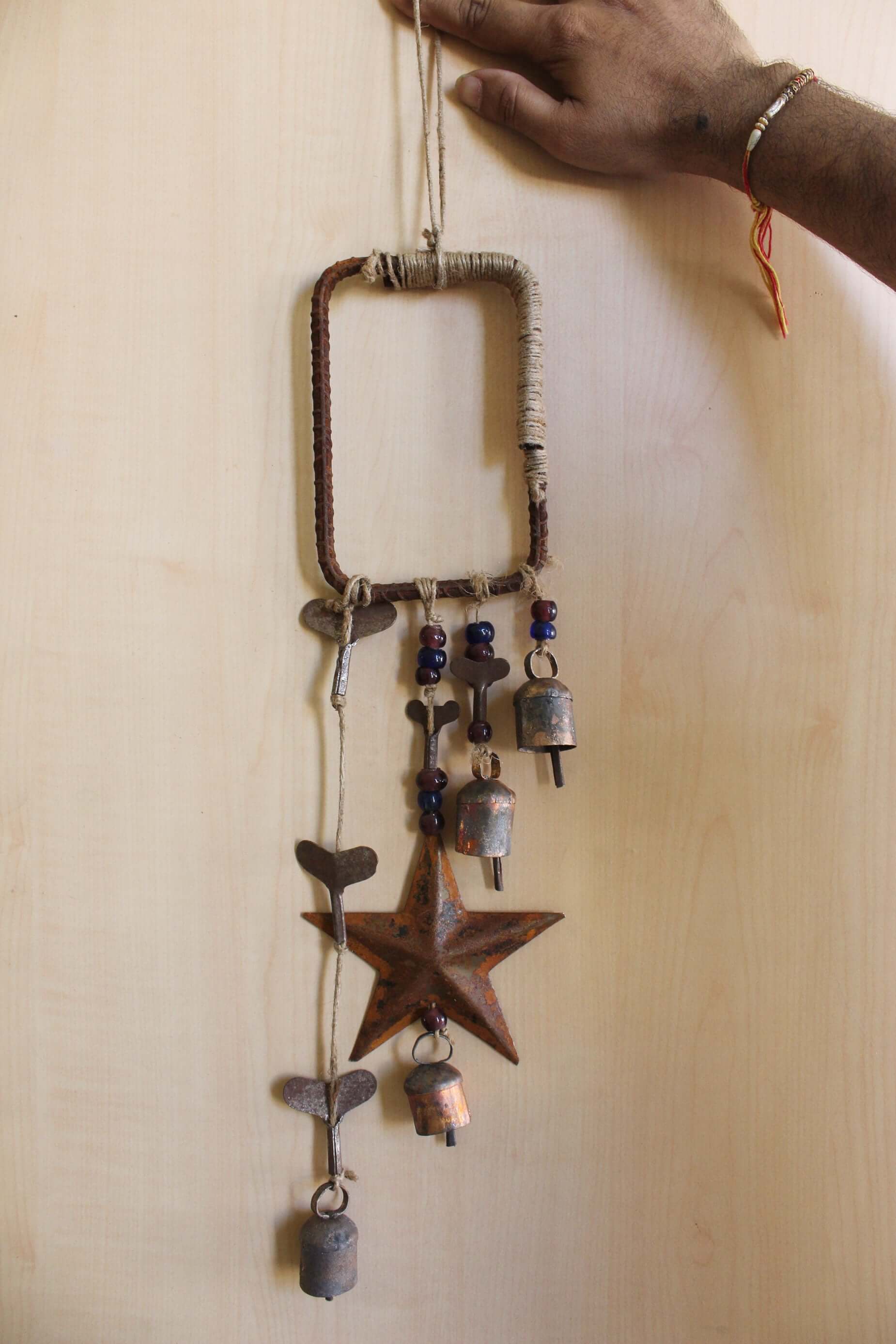 Enhance your Halloween with our handmade Witches Bells. Crafted from recycled materials, these rustic chimes bring protection and charm.