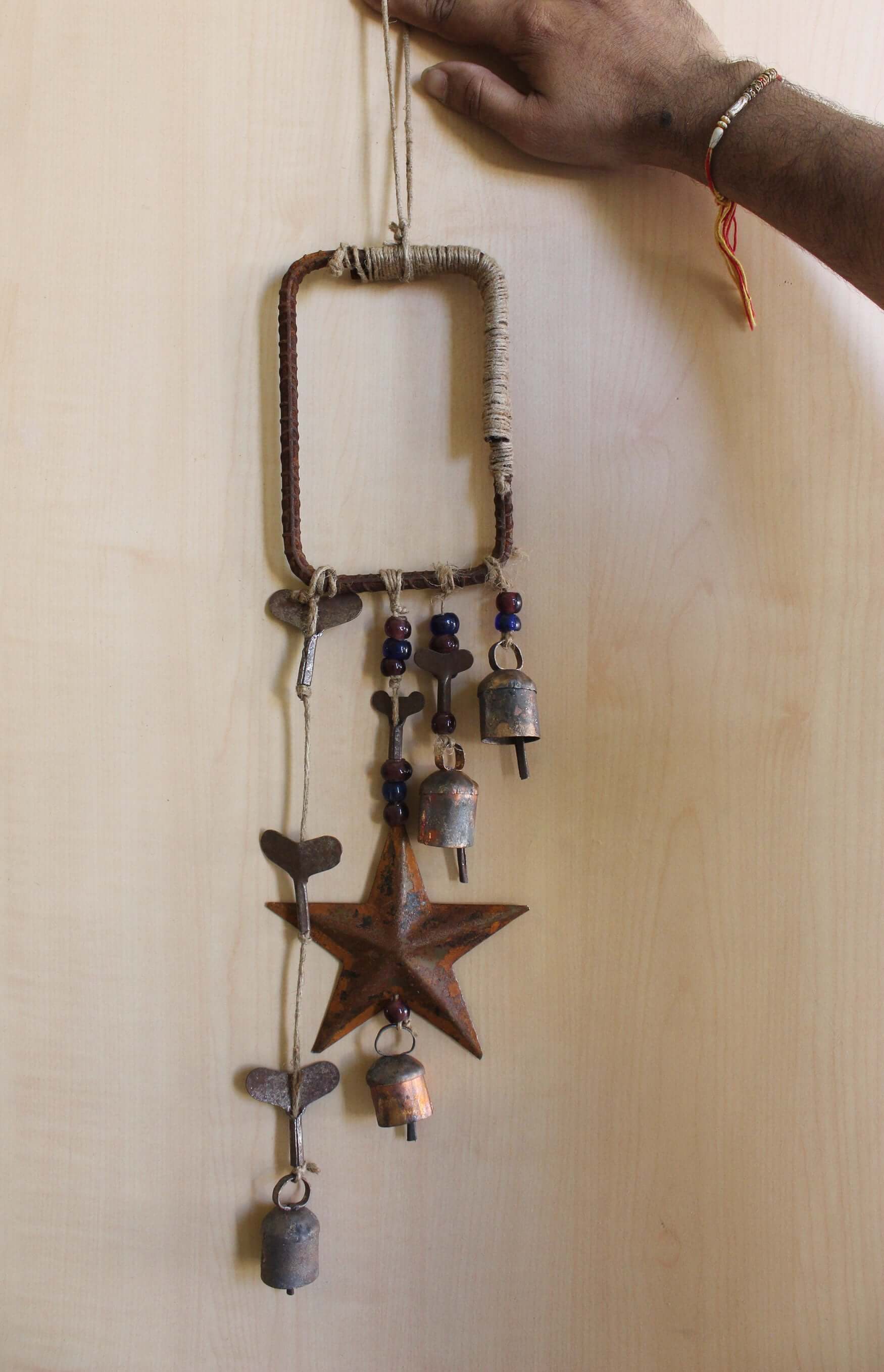 Enhance your Halloween with our handmade Witches Bells. Crafted from recycled materials, these rustic chimes bring protection and charm.