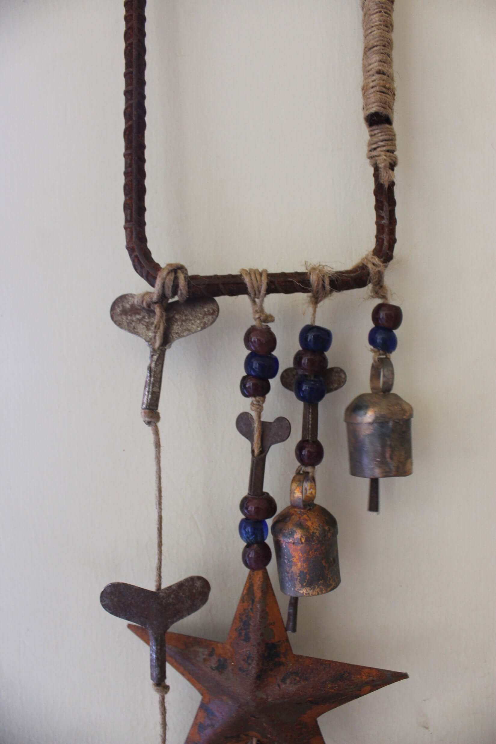 Enhance your Halloween with our handmade Witches Bells. Crafted from recycled materials, these rustic chimes bring protection and charm.