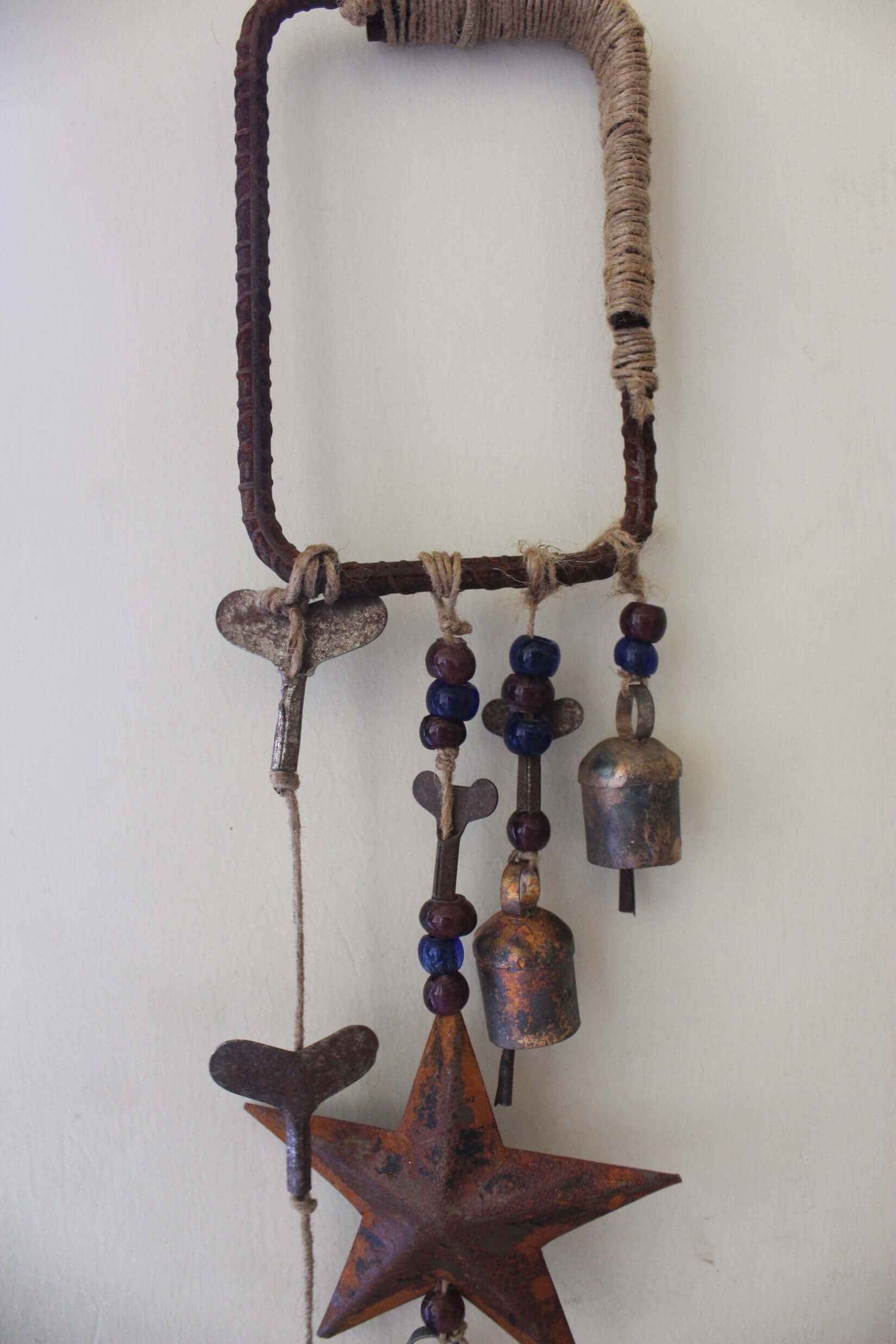 Enhance your Halloween with our handmade Witches Bells. Crafted from recycled materials, these rustic chimes bring protection and charm.