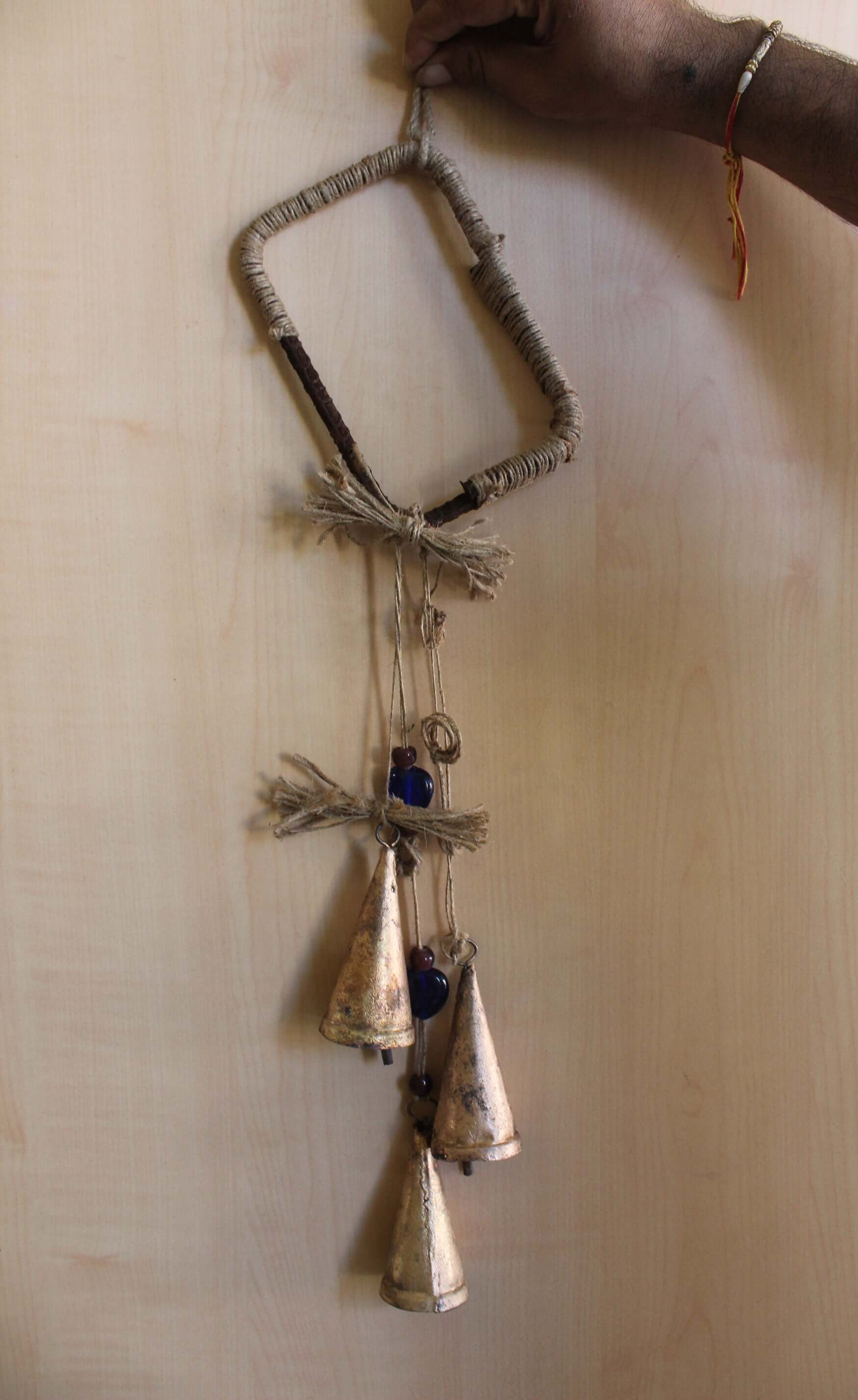 Enhance your Halloween with our handmade Witches Bells. Crafted from recycled materials, these rustic chimes bring protection and charm.