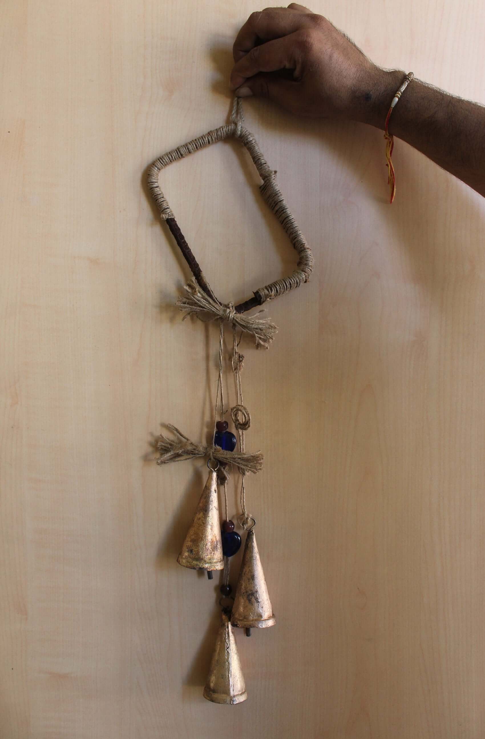 Enhance your Halloween with our handmade Witches Bells. Crafted from recycled materials, these rustic chimes bring protection and charm.