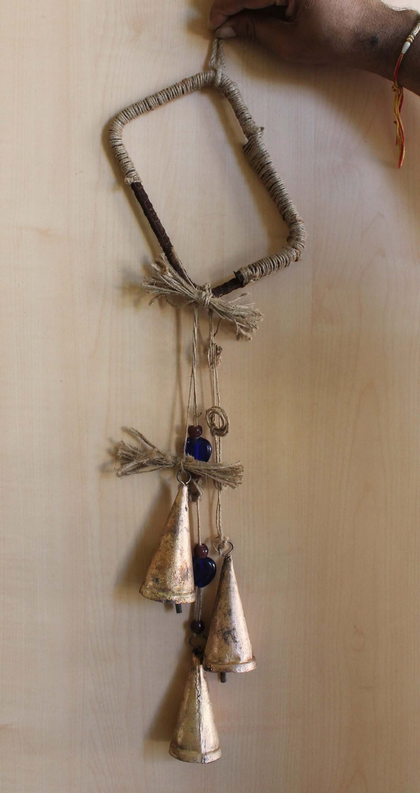 Enhance your Halloween with our handmade Witches Bells. Crafted from recycled materials, these rustic chimes bring protection and charm.