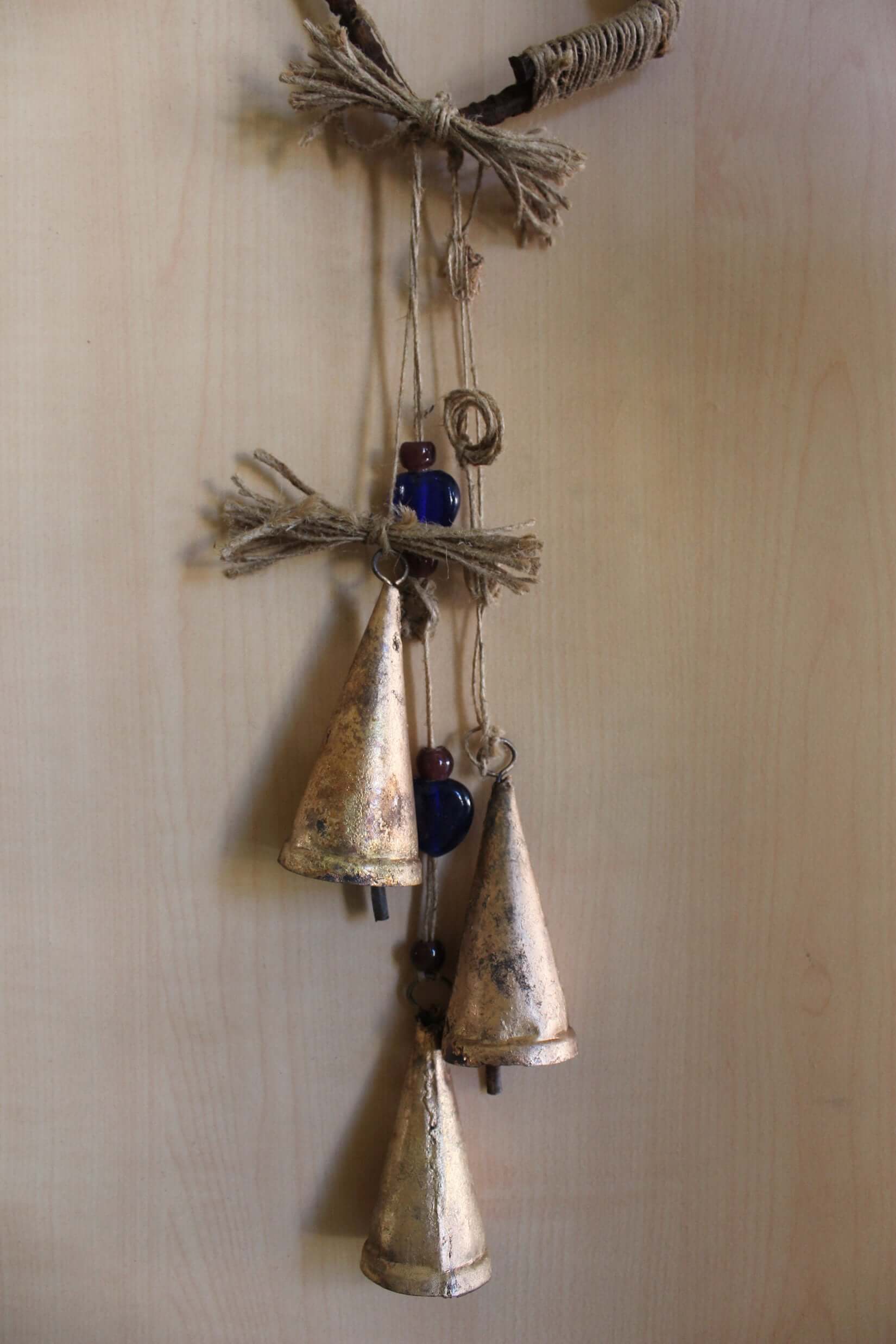 Enhance your Halloween with our handmade Witches Bells. Crafted from recycled materials, these rustic chimes bring protection and charm.