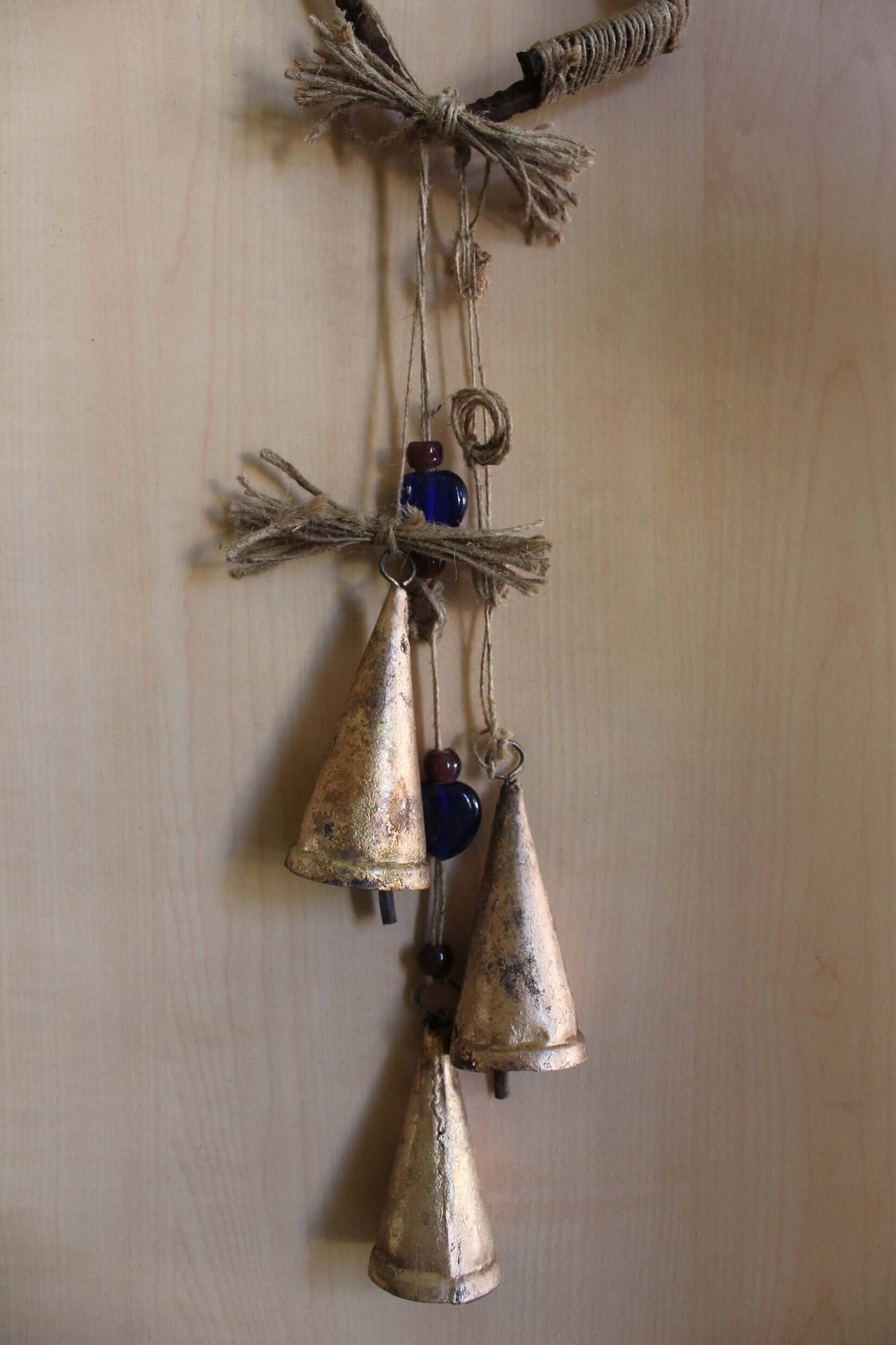 Enhance your Halloween with our handmade Witches Bells. Crafted from recycled materials, these rustic chimes bring protection and charm.
