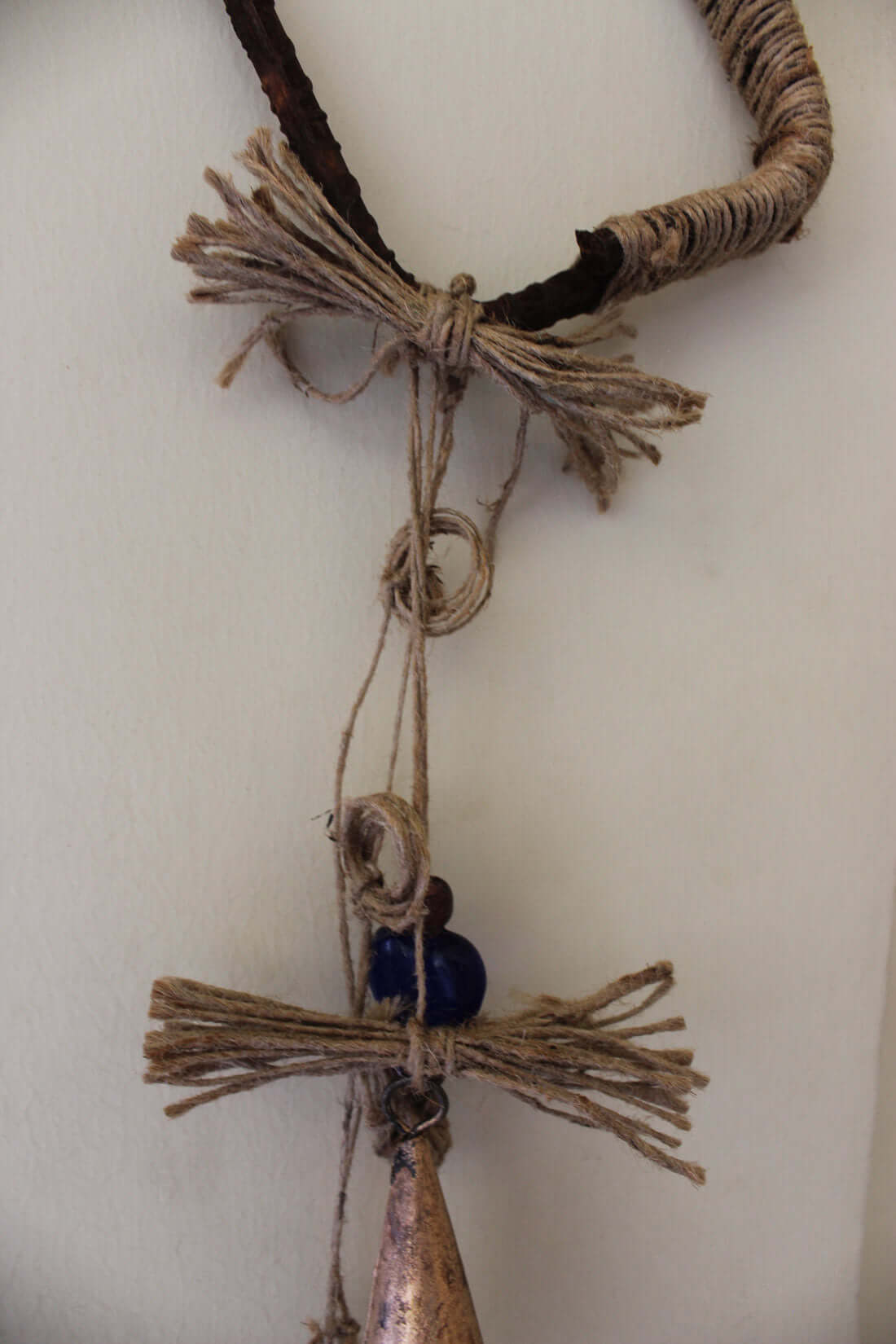 Enhance your Halloween with our handmade Witches Bells. Crafted from recycled materials, these rustic chimes bring protection and charm.