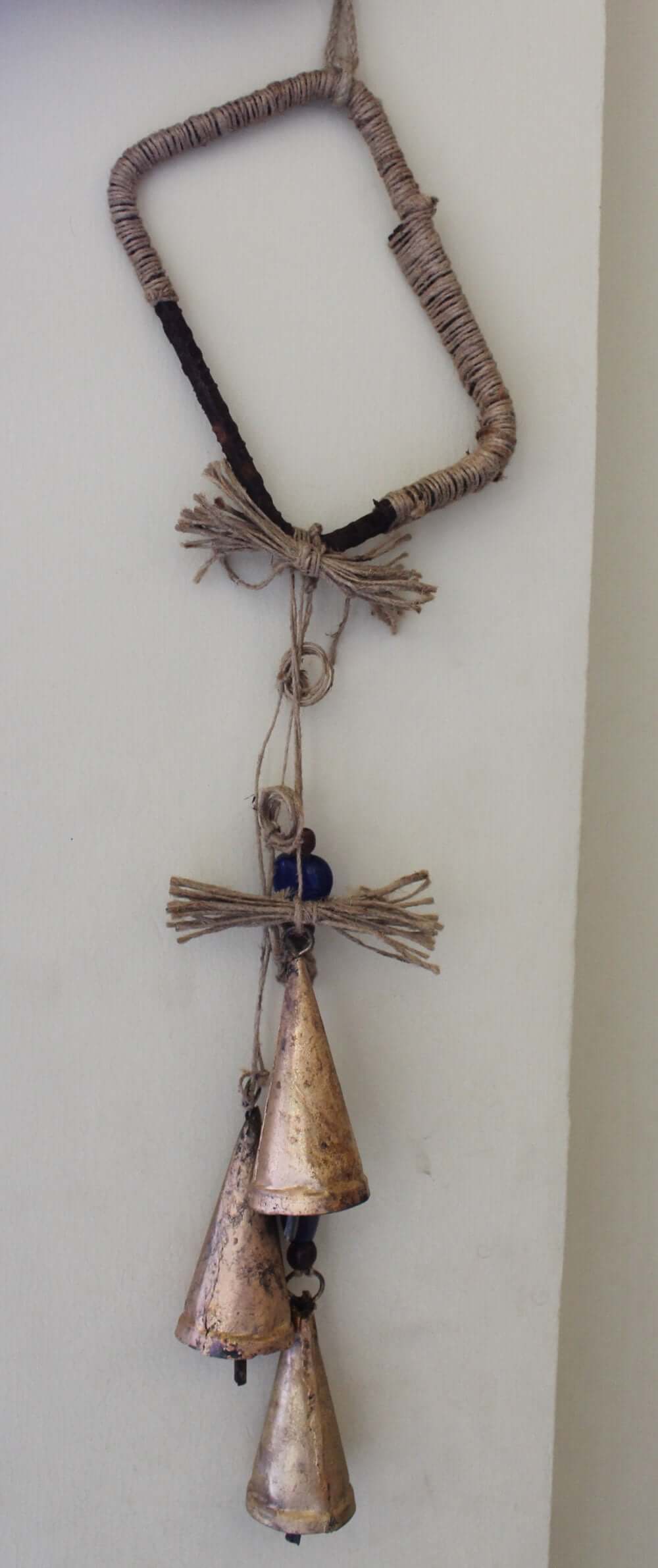 Enhance your Halloween with our handmade Witches Bells. Crafted from recycled materials, these rustic chimes bring protection and charm.