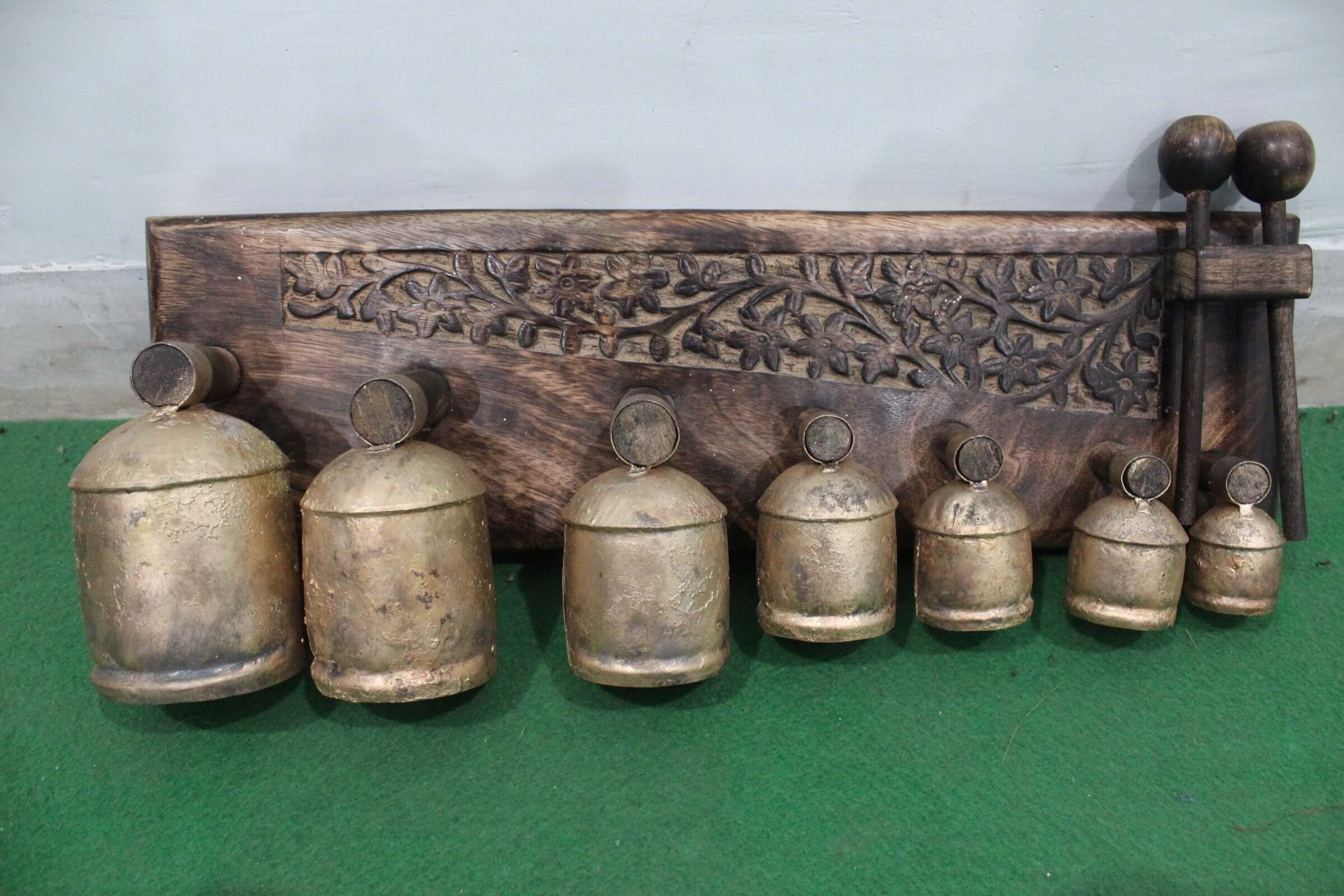 Discover the Handmade Bell Xylophone with 7 antique gold bells. Perfect for music lovers, educators, and collectors. Eco-friendly and beautifully crafted!