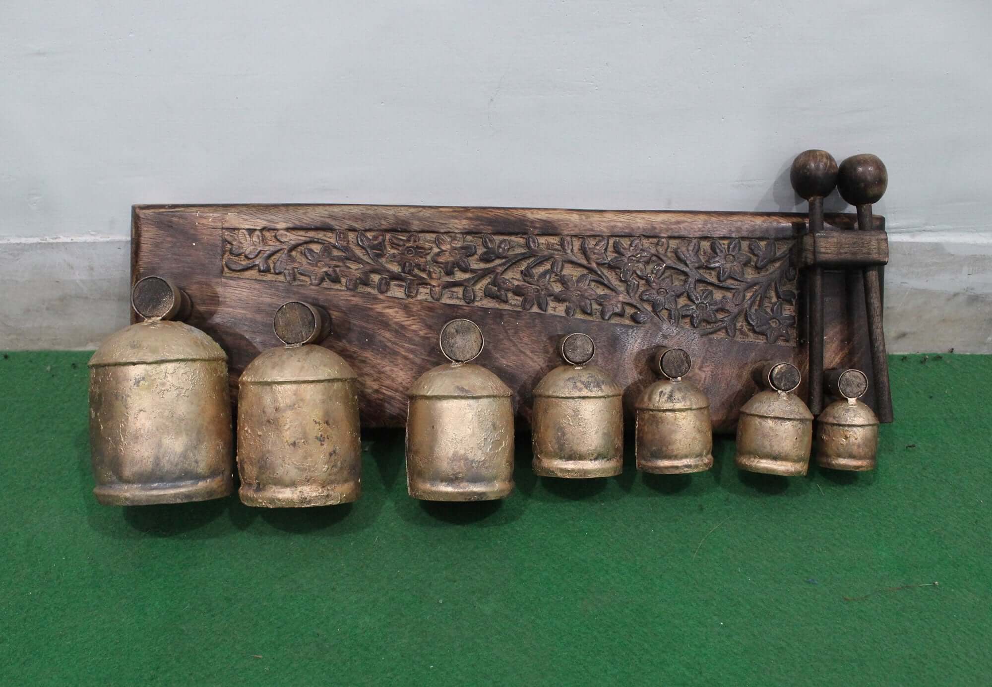 Discover the Handmade Bell Xylophone with 7 antique gold bells. Perfect for music lovers, educators, and collectors. Eco-friendly and beautifully crafted!