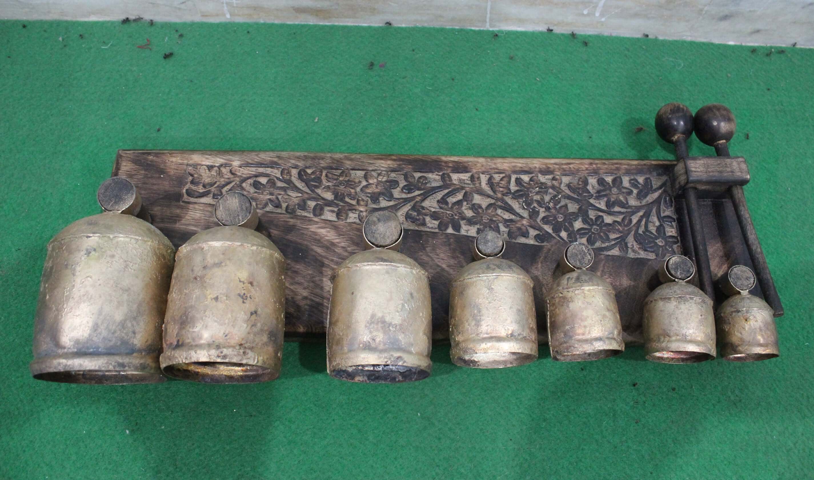 Discover the Handmade Bell Xylophone with 7 antique gold bells. Perfect for music lovers, educators, and collectors. Eco-friendly and beautifully crafted!