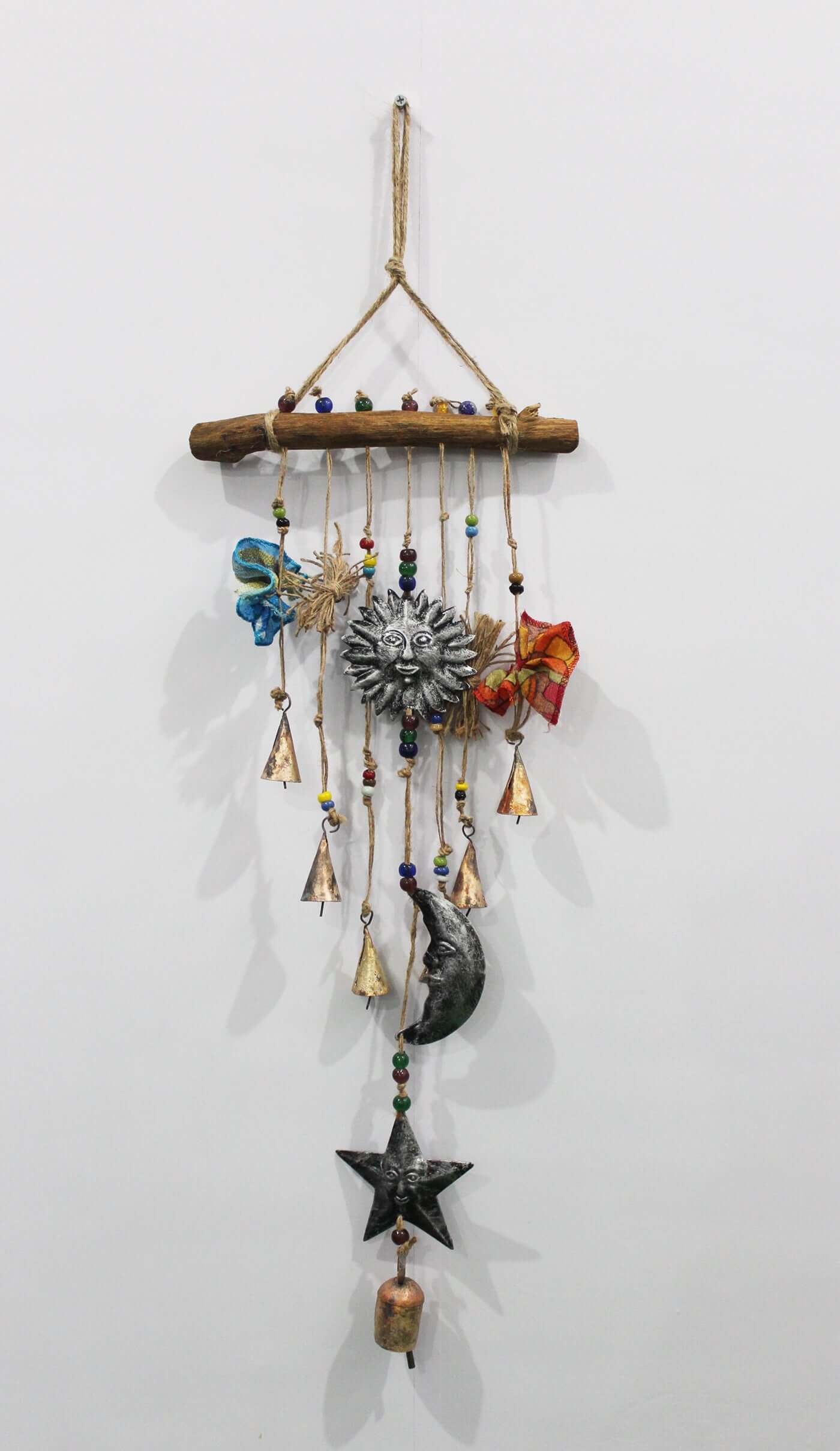 Enhance your garden with our rustic wind chimes made from recycled materials. Perfect for patio and outdoor décor. Assorted designs available!