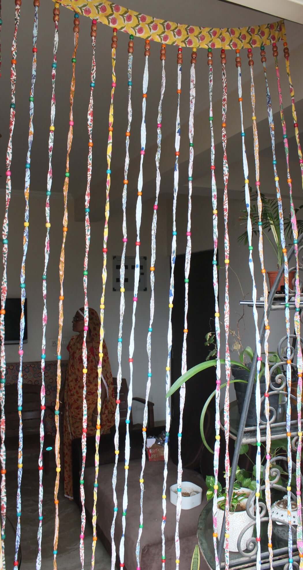 Handmade 100% cotton floral garland curtains, eco-friendly, easy to hang. Perfect for doorways or wall decor. Add a vibrant touch to your home!