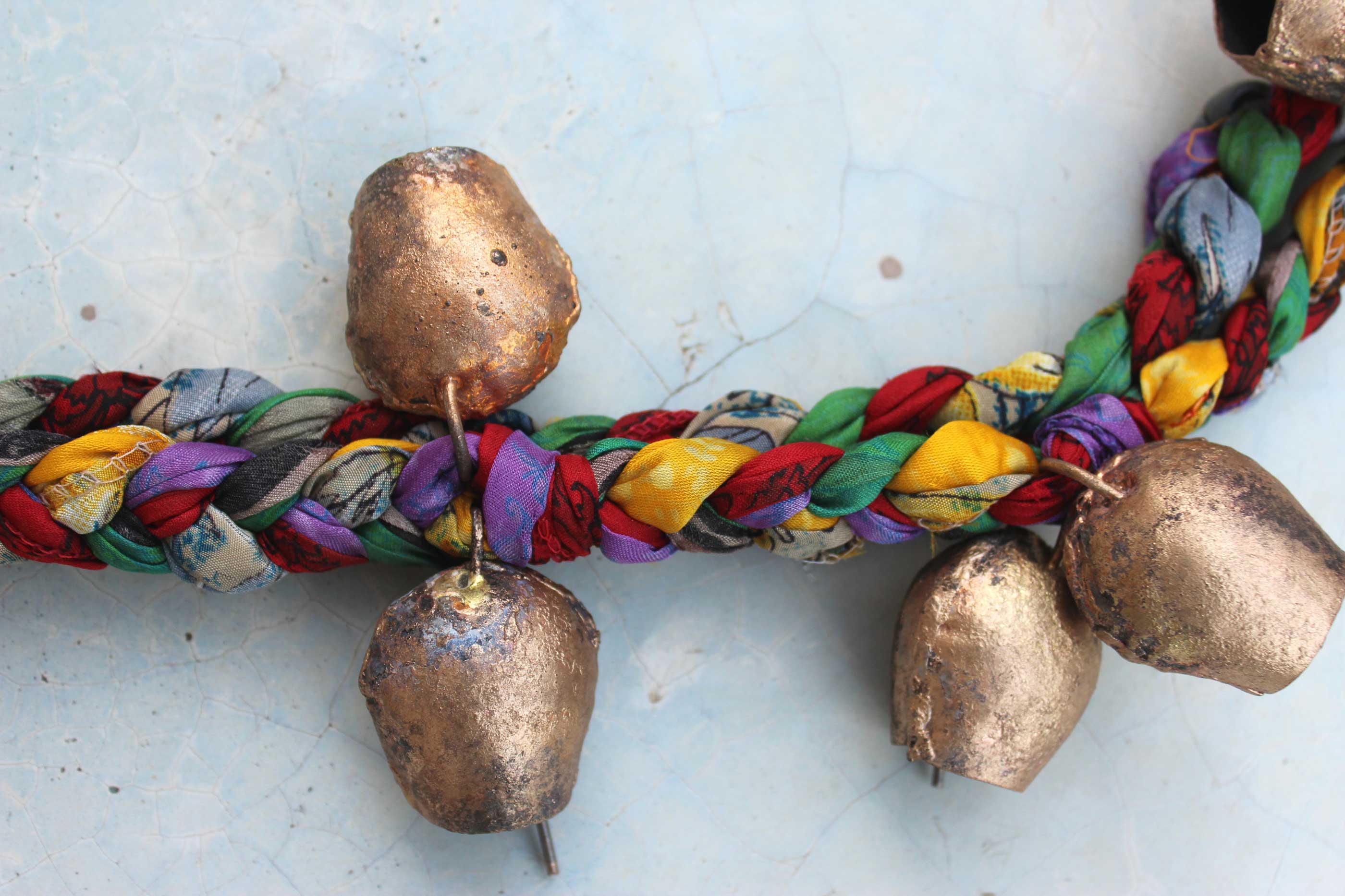 Enhance your space with our multicolor handmade chimes, featuring 11 tin bells and old silk sari. Perfect for relaxation and unique charm!