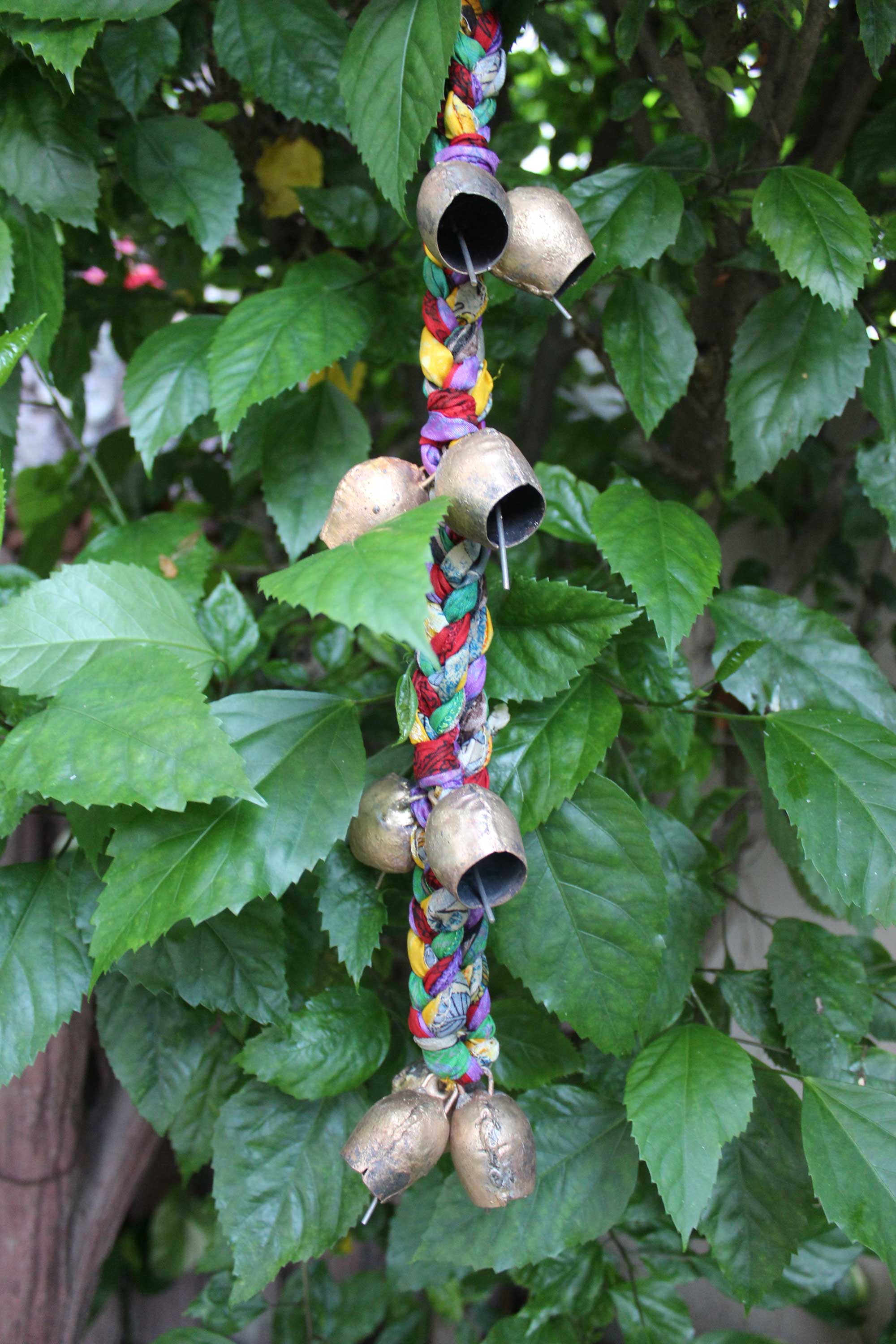 Enhance your space with our multicolor handmade chimes, featuring 11 tin bells and old silk sari. Perfect for relaxation and unique charm!