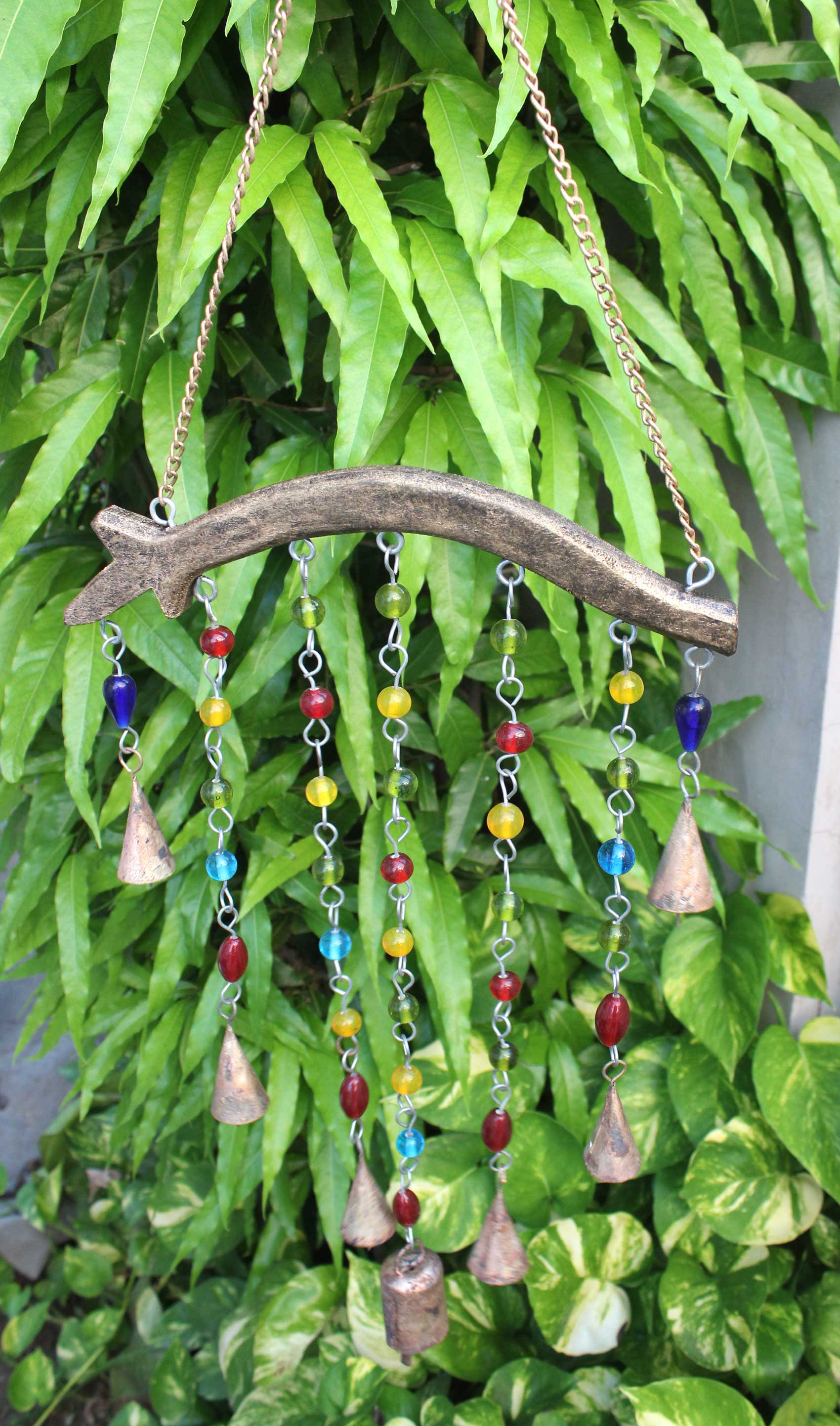 Handmade beaded iron windchime hanging mobile with colorful bells and bohemian design, perfect for home decor.