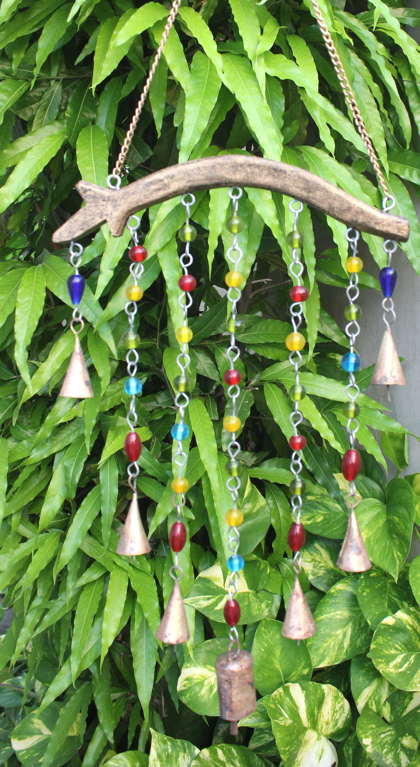 Handmade hanging chime bells and colorful beads decoration for garden and patio, crafts from India.