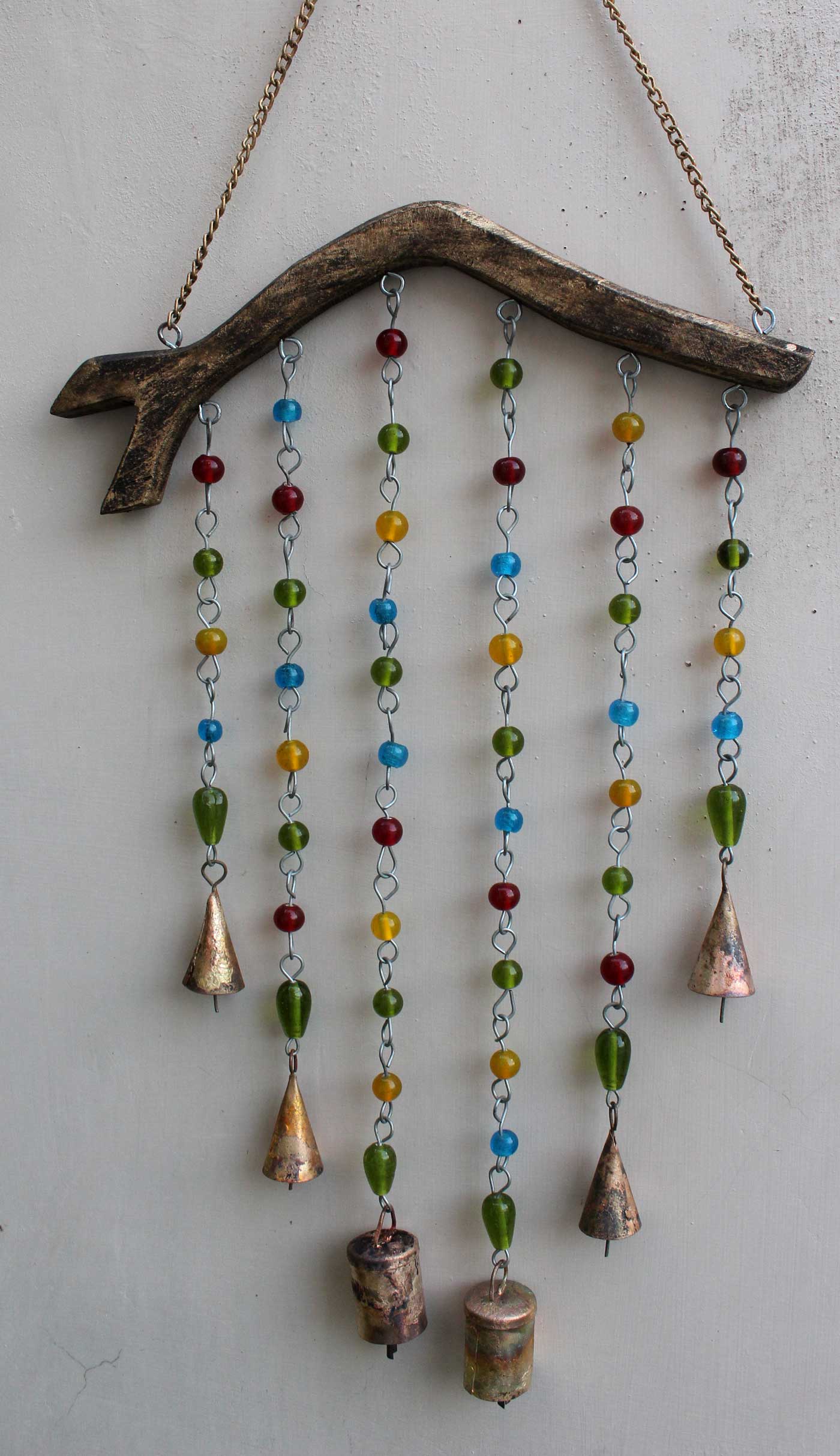 Handmade beaded wind chime featuring metal bells and colorful glass beads, perfect for Boho decor.