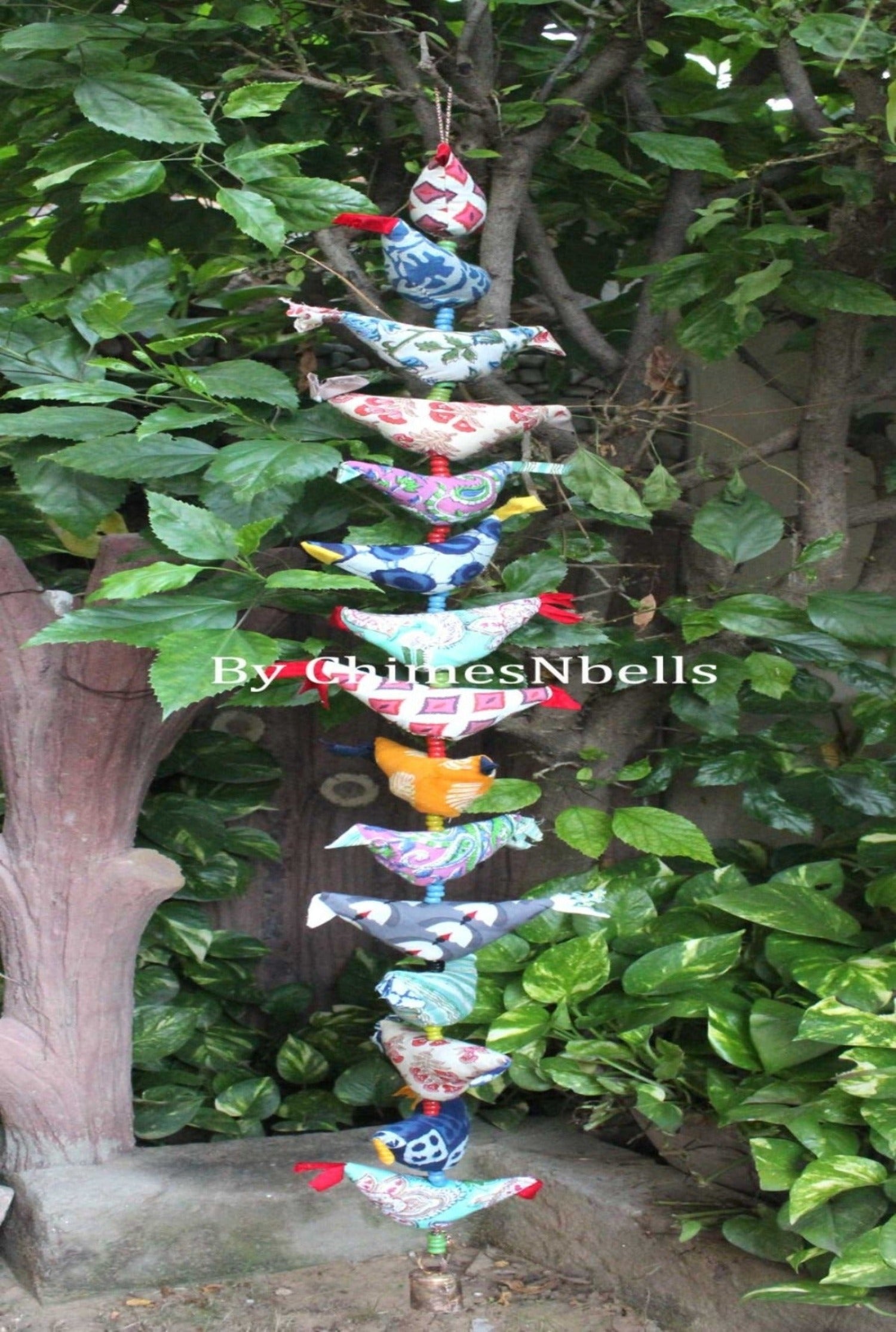 Welcome guests with this 90 cm handmade bird bell string decoration. Perfect boho home ornament.