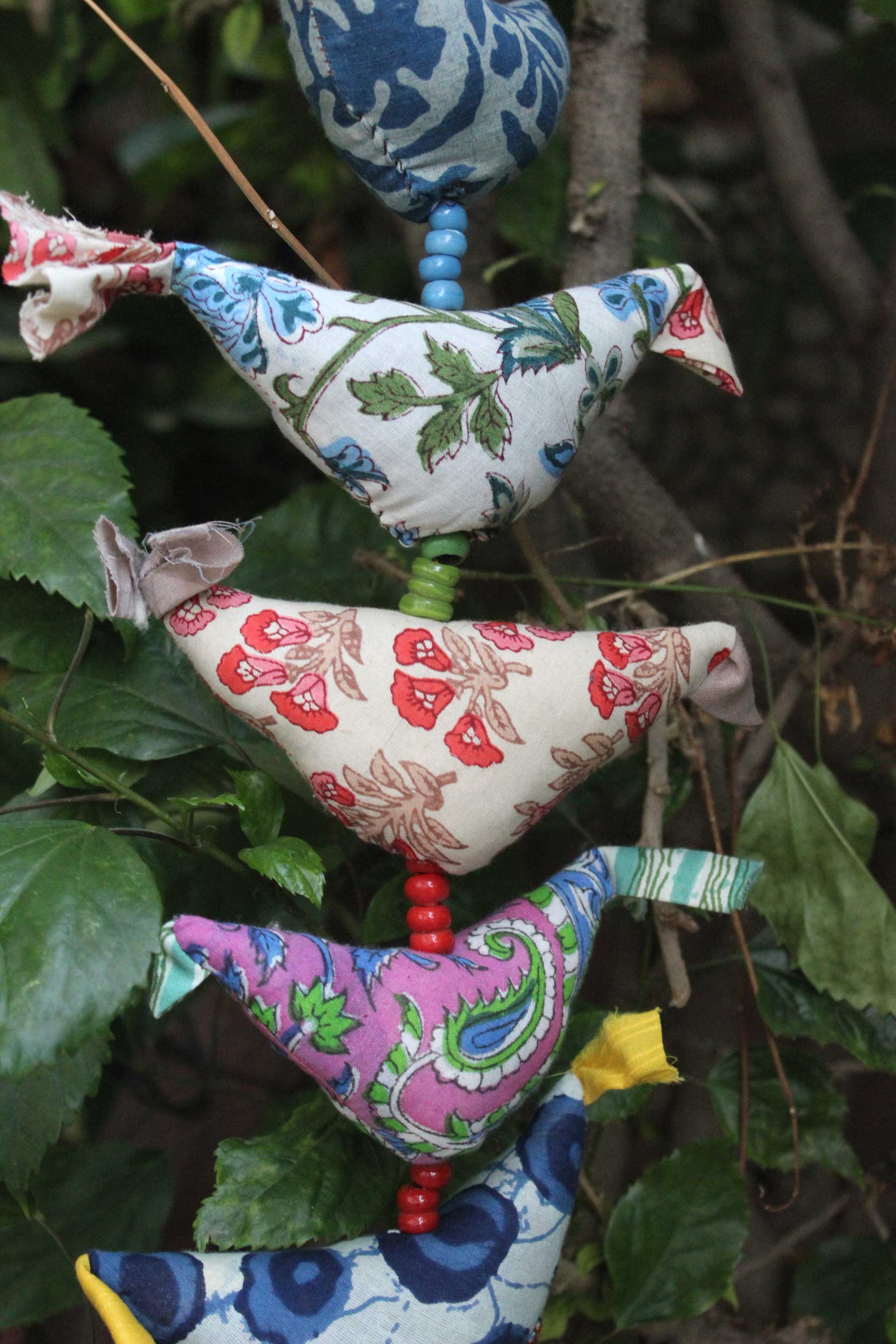 Welcome guests with this 90 cm handmade bird bell string decoration. Perfect boho home ornament.