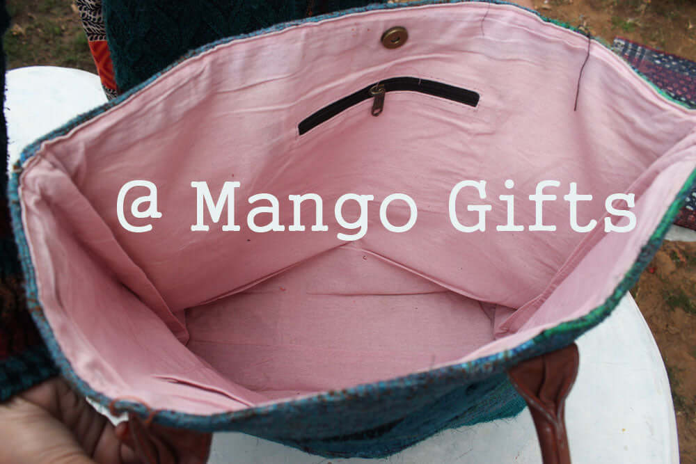 Interior view of Handmade Chindi Rug Tote Bag with pink lining and zipper pocket