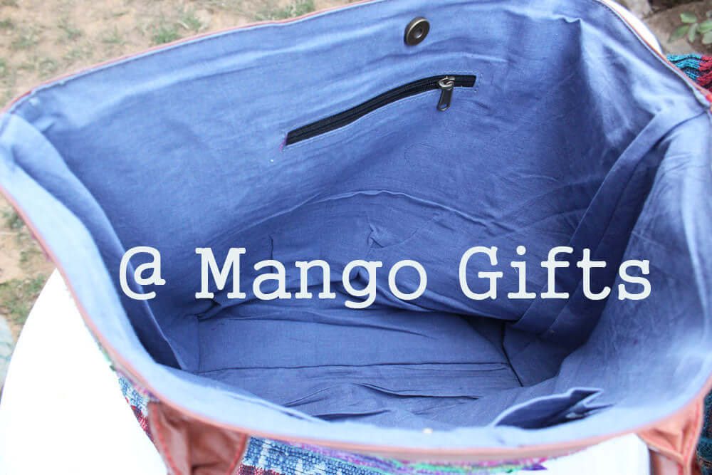 Inside view of Chindi Rug Tote Bag, showcasing spacious interior with zipper pocket and cotton lining.