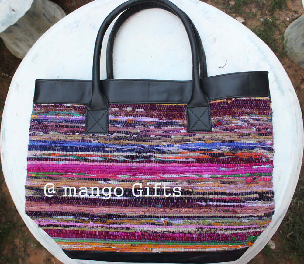 Colorful Chindi Rug Tote Bag with Leather Straps, perfect for shopping or picnics, handmade in India.
