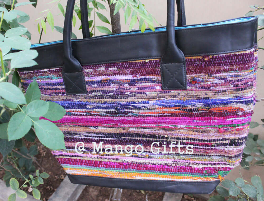 Colorful Chindi Rug Tote Bag with Leather Straps, perfect for shopping and picnics, handcrafted in India.