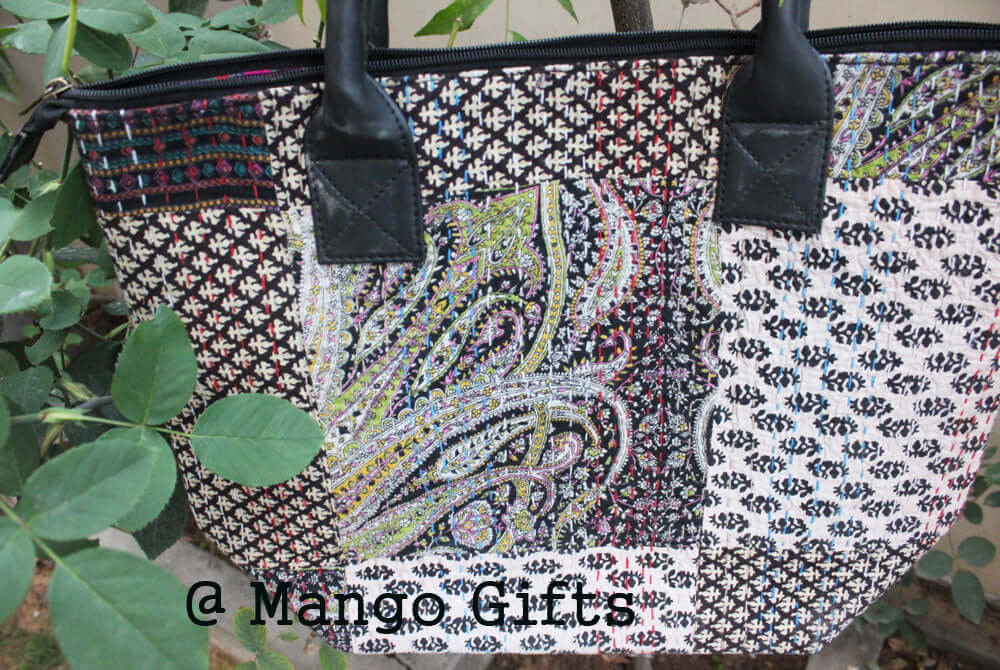 Discover our Vintage Tota Rug Bag, perfect for shopping and picnics. Handmade in India with a stylish black-beige design.