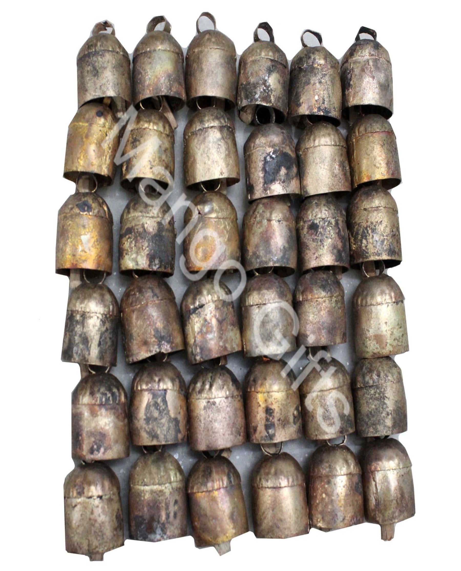 Explore our unique 2" rustic tin bells made from recycled iron with a vintage finish. Perfect for DIY projects and wall hanging decor!