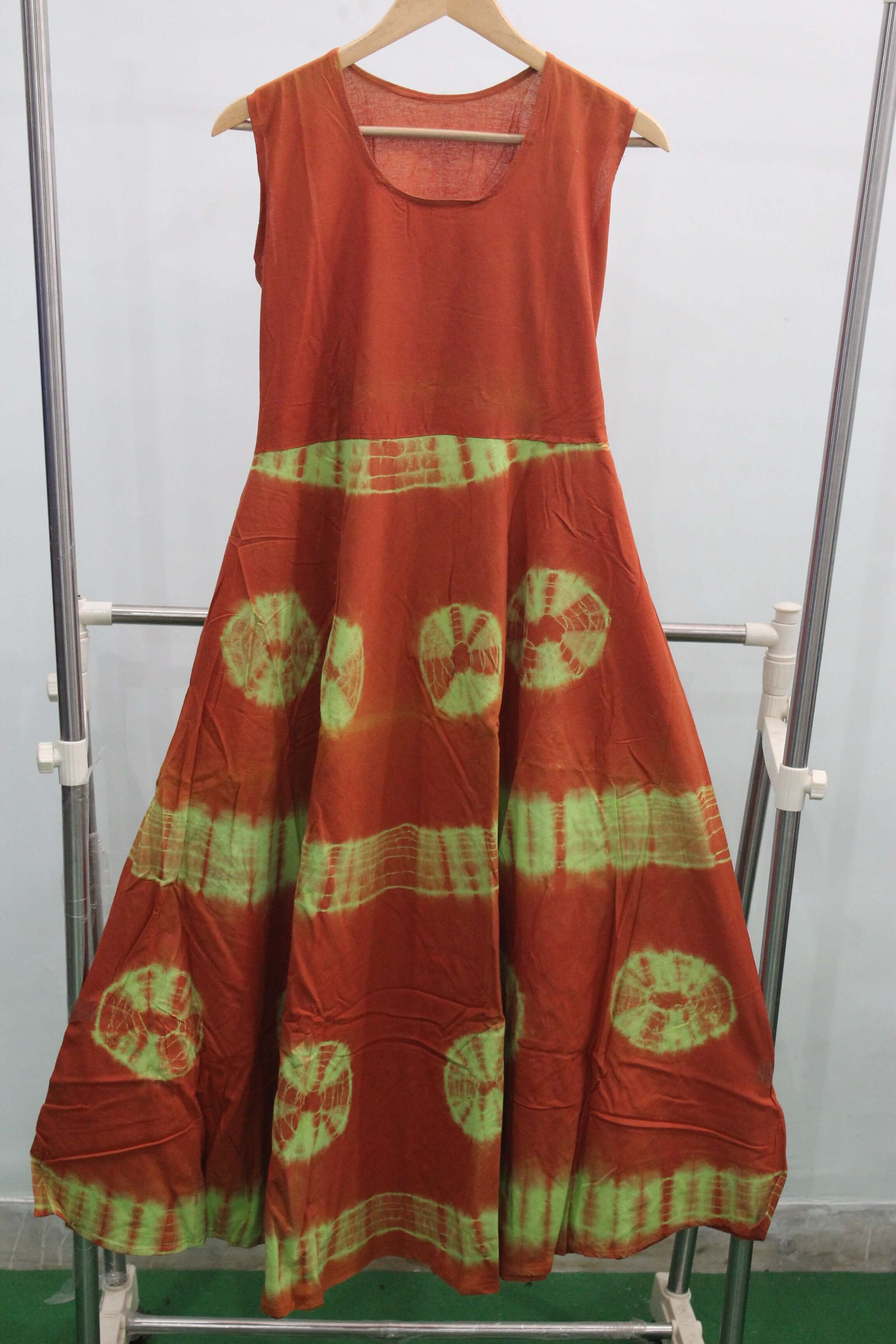 Cotton tie-dye maxi dress in orange and green, perfect for summer beach outings and boho styles.