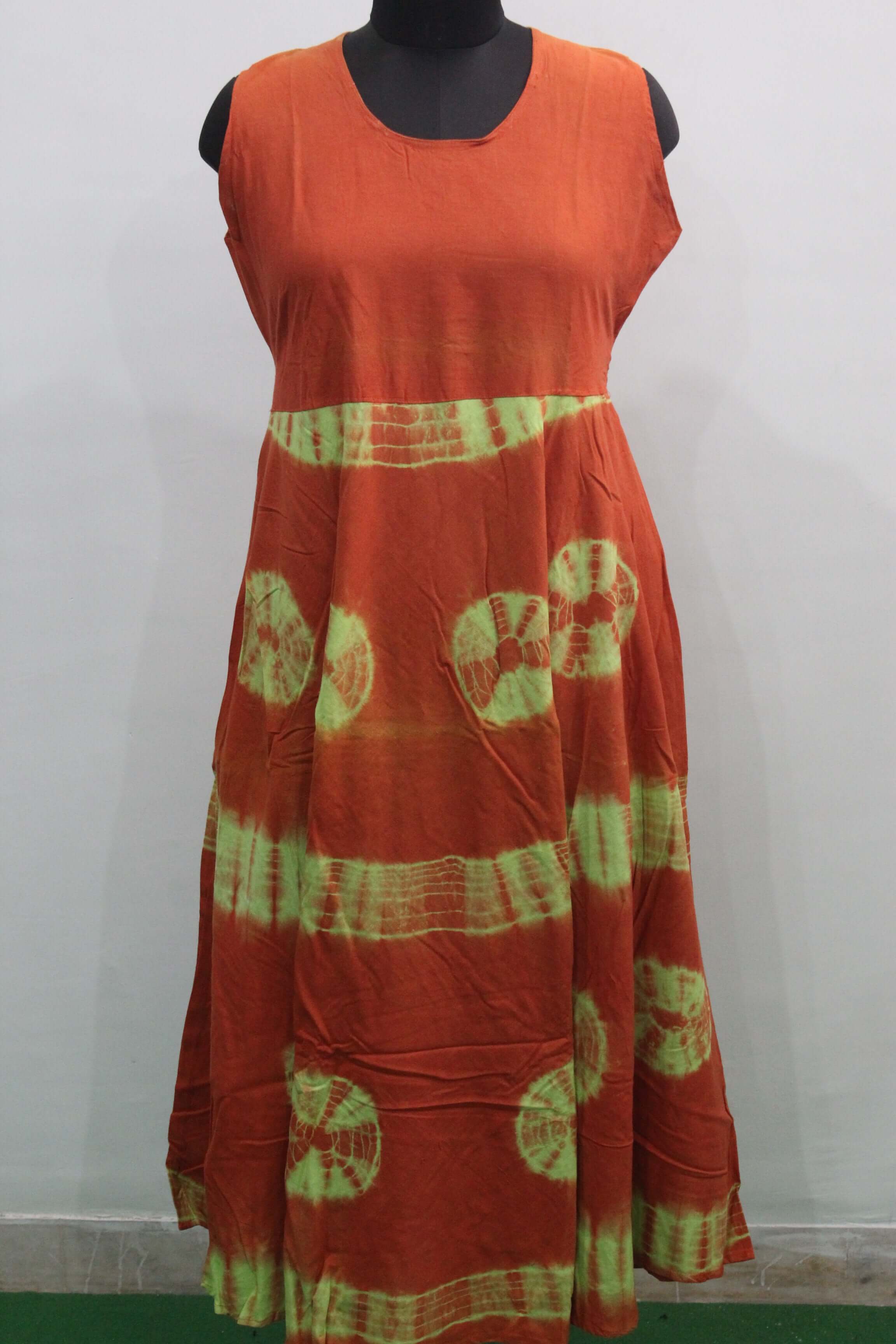 Cotton tie-dye maxi dress in orange and green, perfect for boho beach summer style for women.
