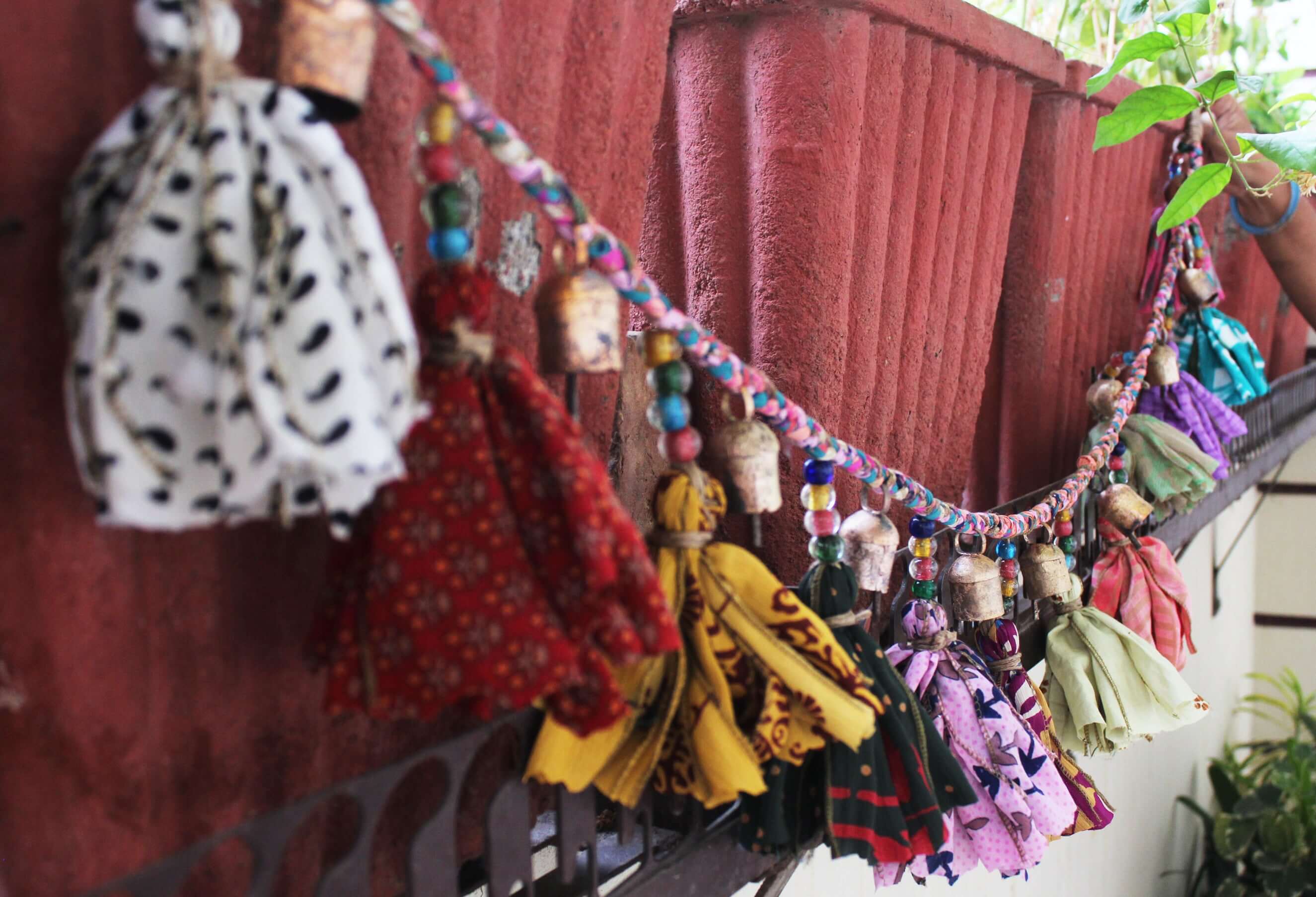 Adorn your space with this 5ft handmade garland of brass bells and glass beads. Perfect for parties and home decoration.