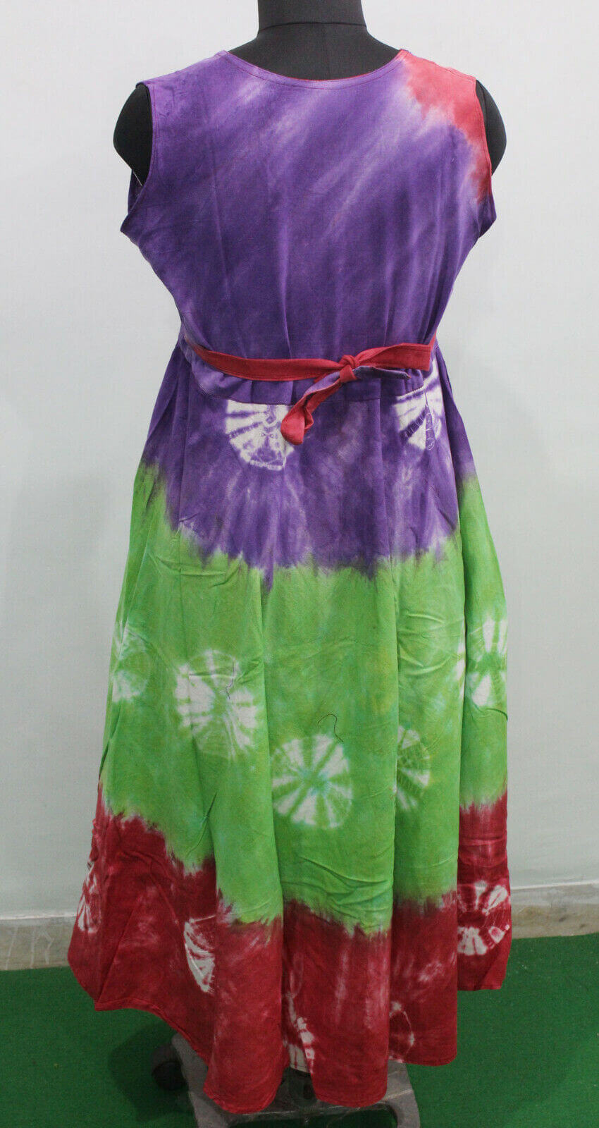 Cotton tie-dye maxi dress in purple, green, and red, perfect for summer beach wear, featuring a belt and pockets.