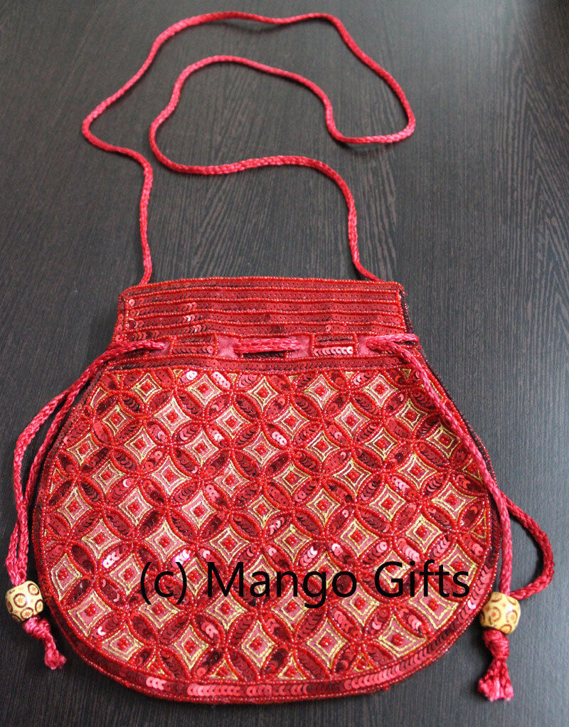 Beautiful red handmade Indian potli bag with sequins, ideal for fashion and storing small essentials.